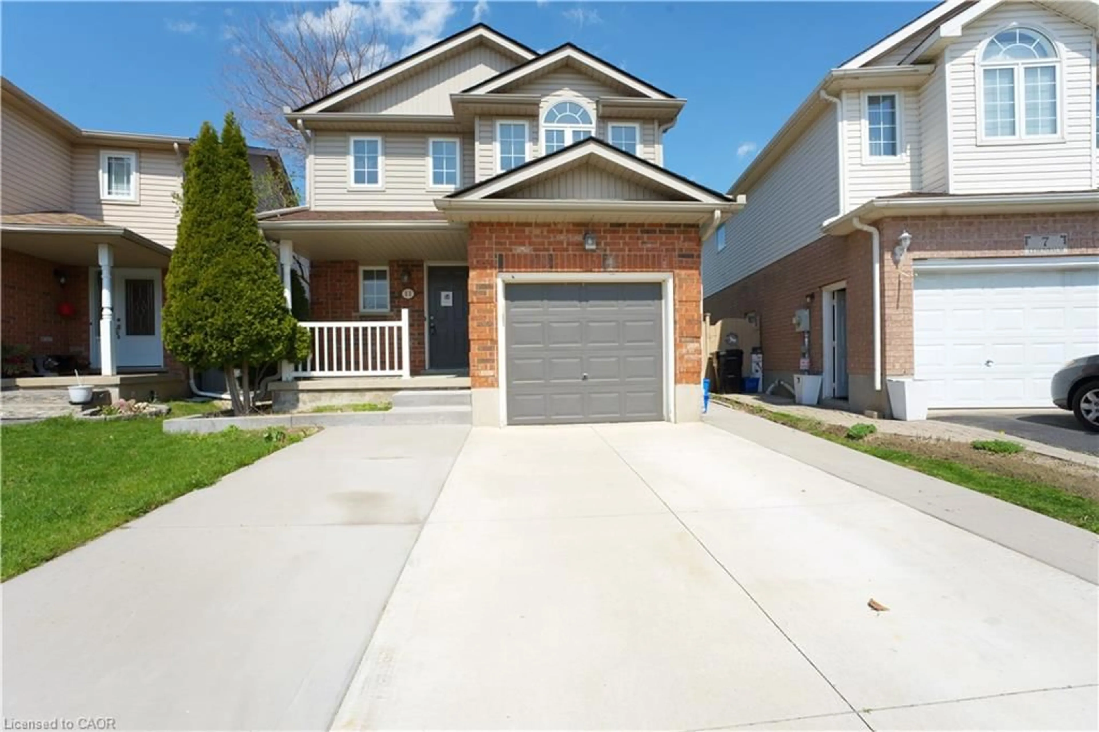Home with brick exterior material, street for 11 Lemonbalm St, Kitchener Ontario N2E 1Z7