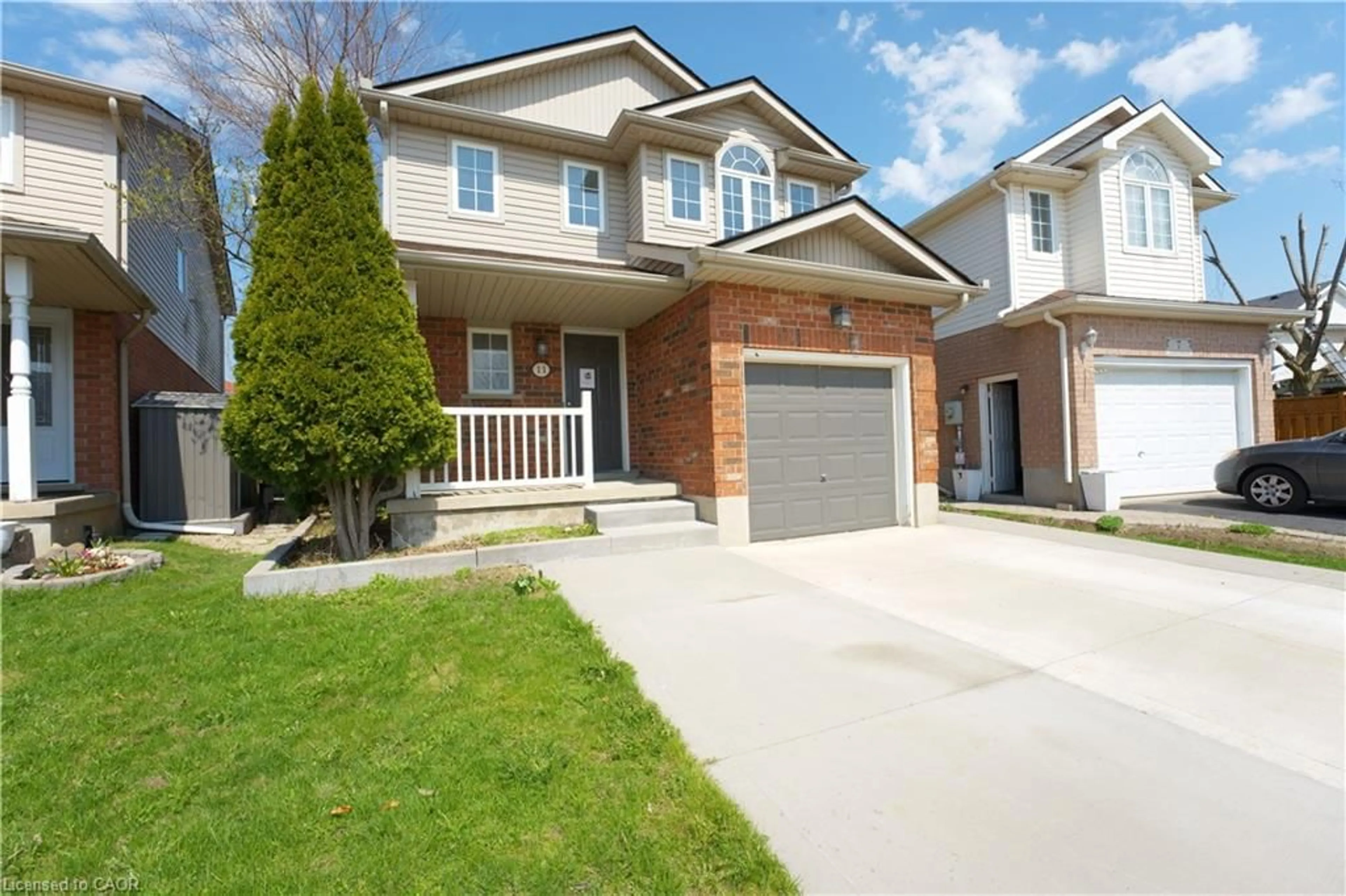 Home with brick exterior material, street for 11 Lemonbalm St, Kitchener Ontario N2E 1Z7