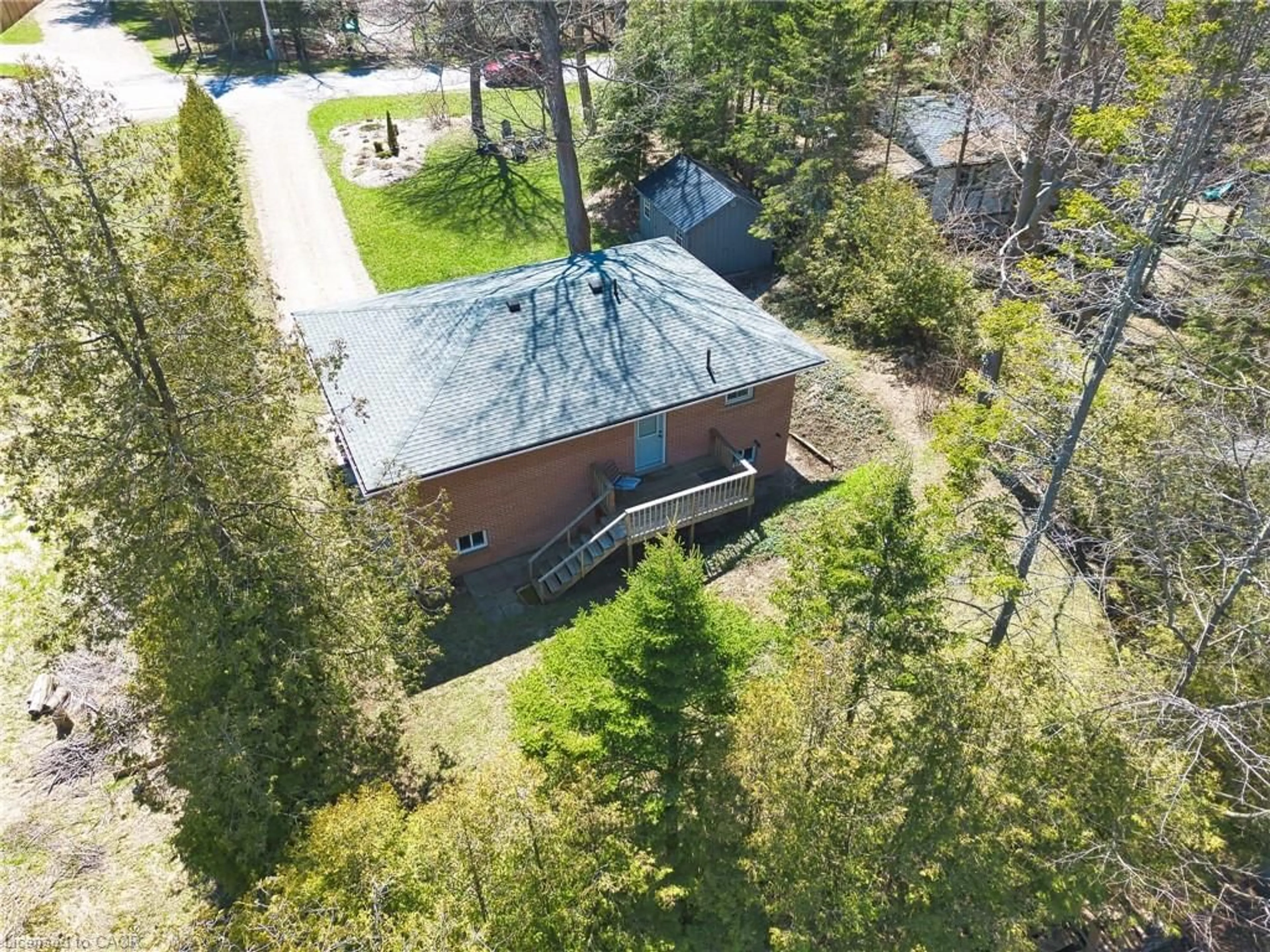 A pic from outside/outdoor area/front of a property/back of a property/a pic from drone, forest/trees view for 122 Hemlock St, Kincardine Ontario N2Z 2X3