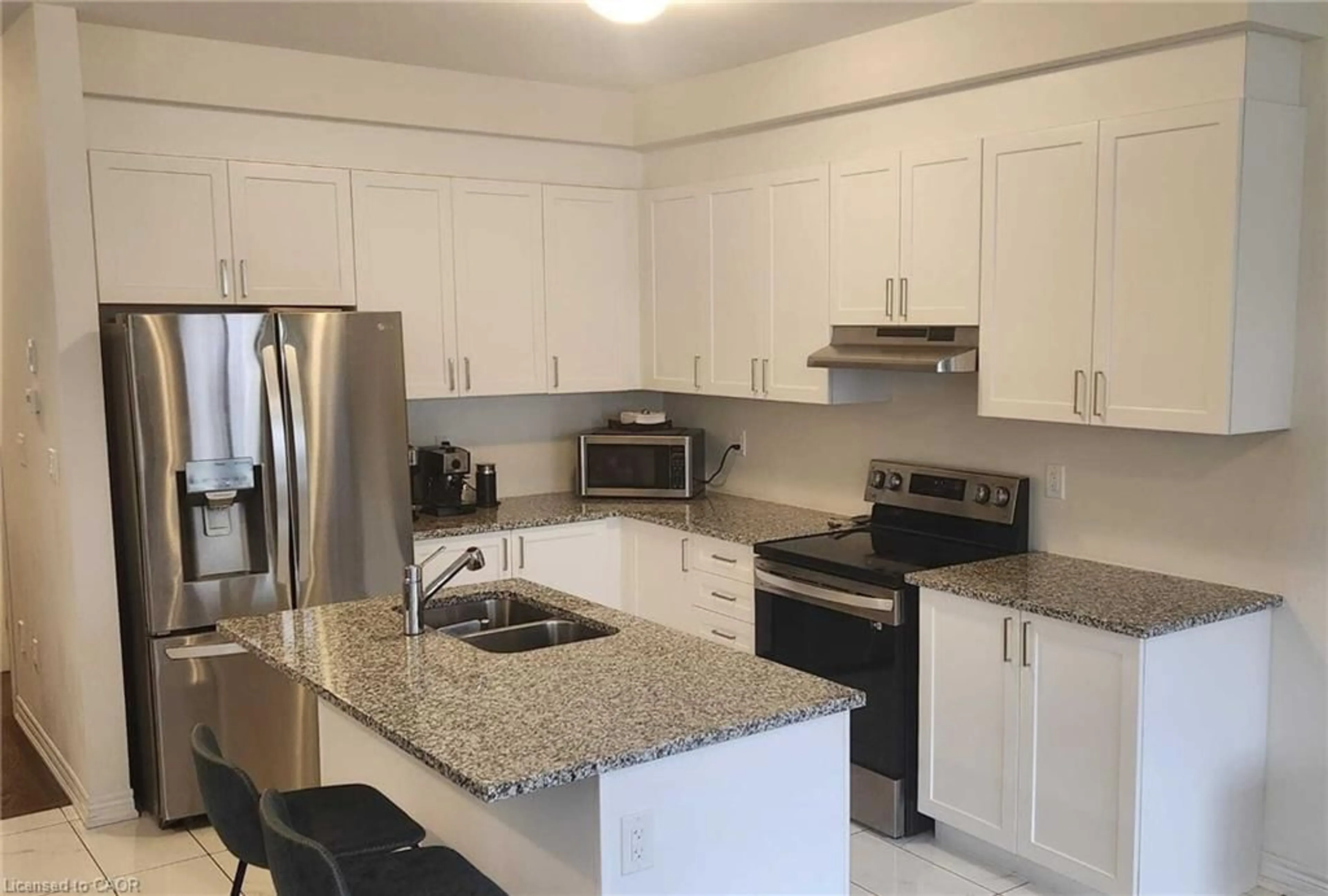 Open concept kitchen, unknown for 130 Ice Palace Cres, Oshawa Ontario L1L 0G9
