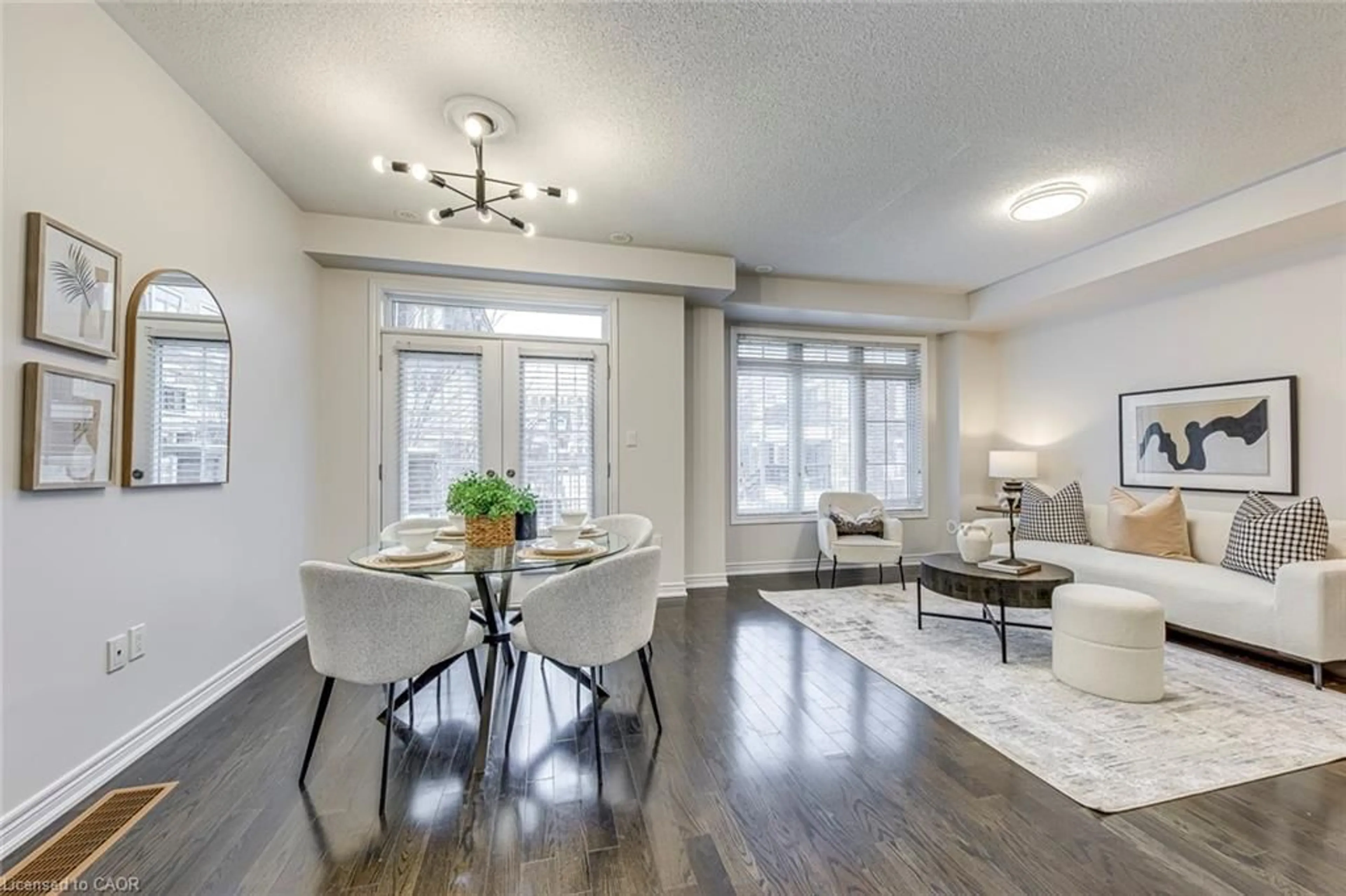 Living room with furniture, wood/laminate floor for 2435 Greenwich Dr #74, Oakville Ontario L6M 0S4