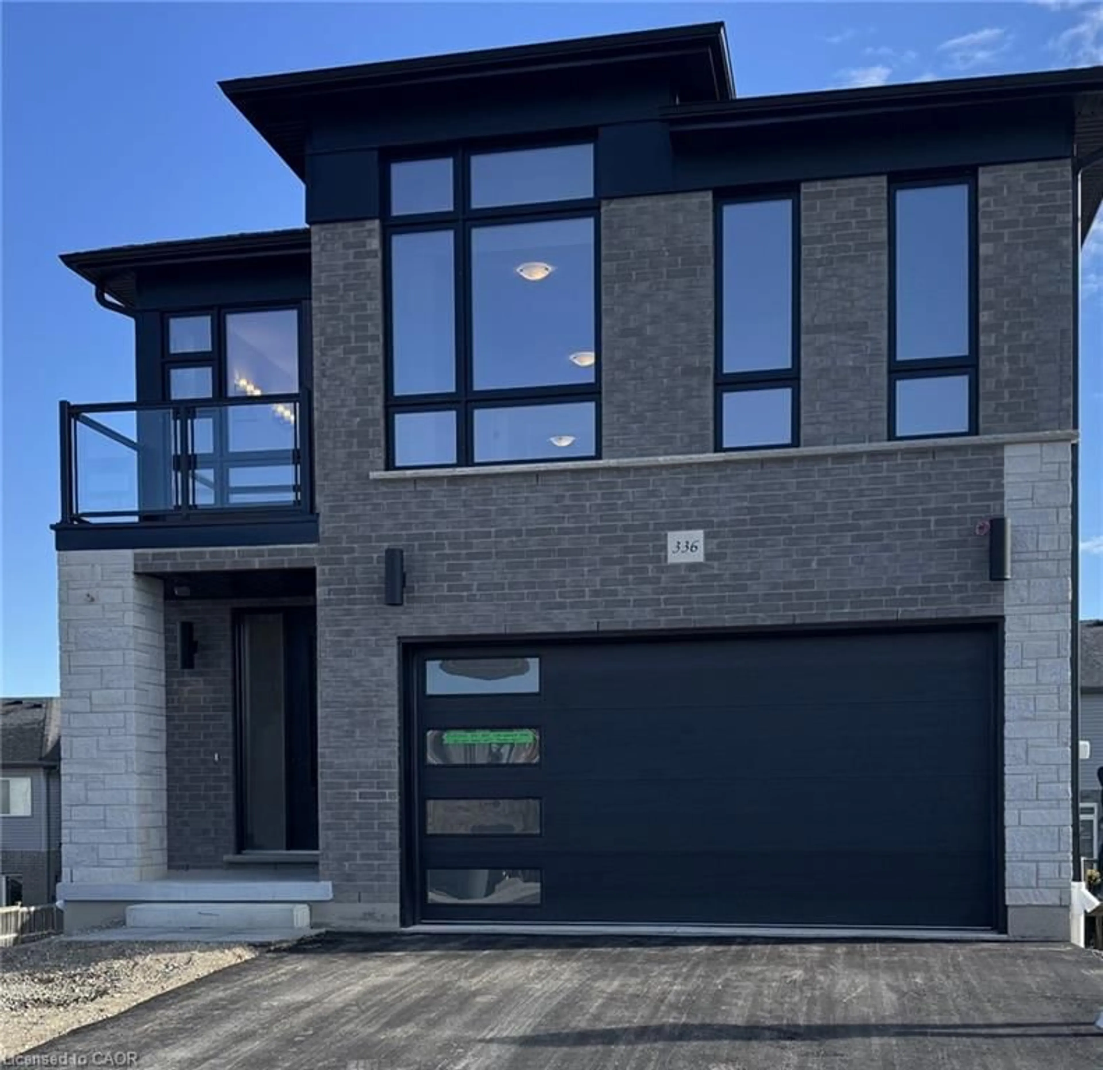 Home with brick exterior material, street for 336 Canada Plum St, Waterloo Ontario N2V 0C3