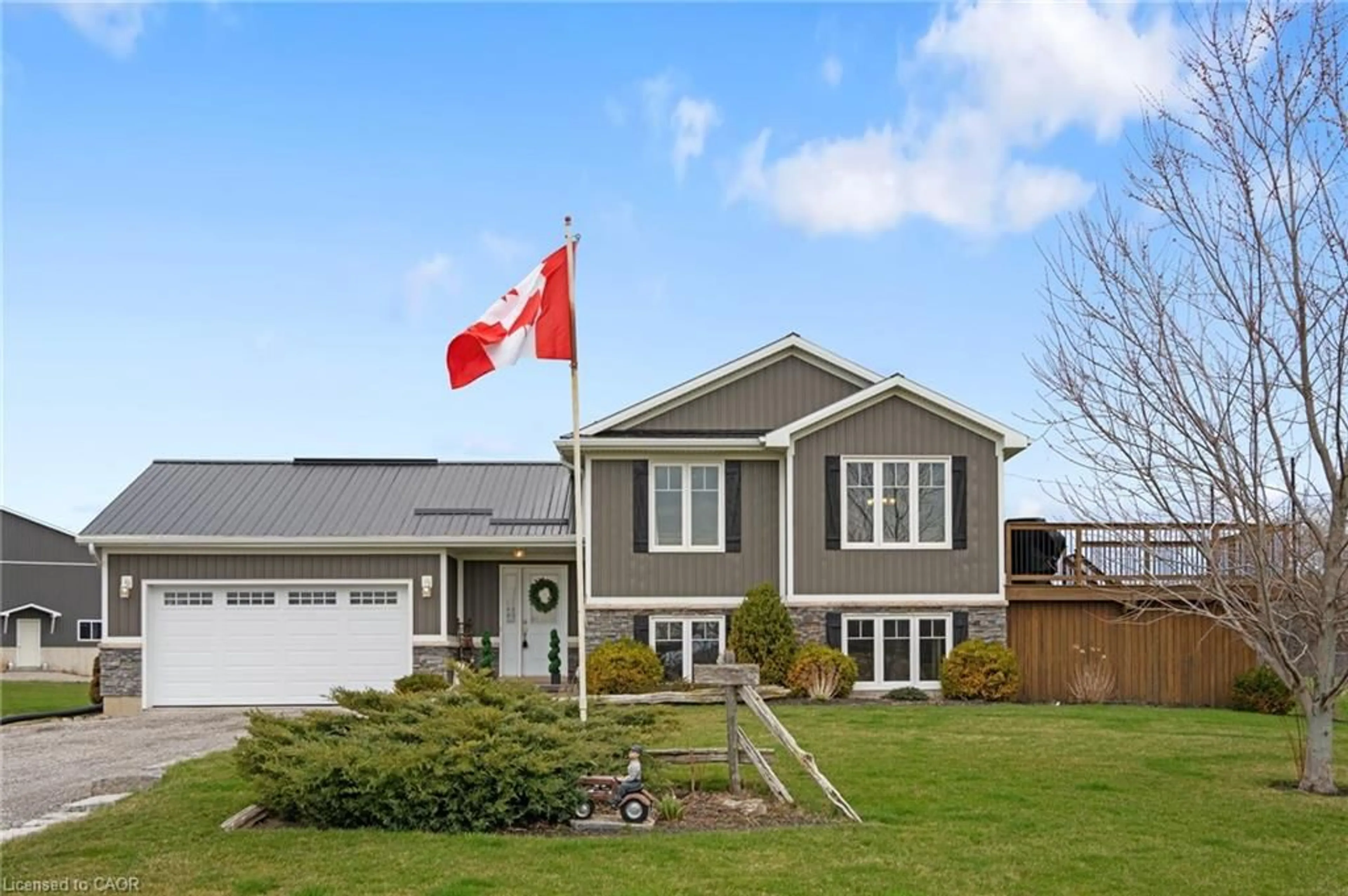 Home with vinyl exterior material, street for 2461 Highway 6, Jarvis Ontario N0A 1J0