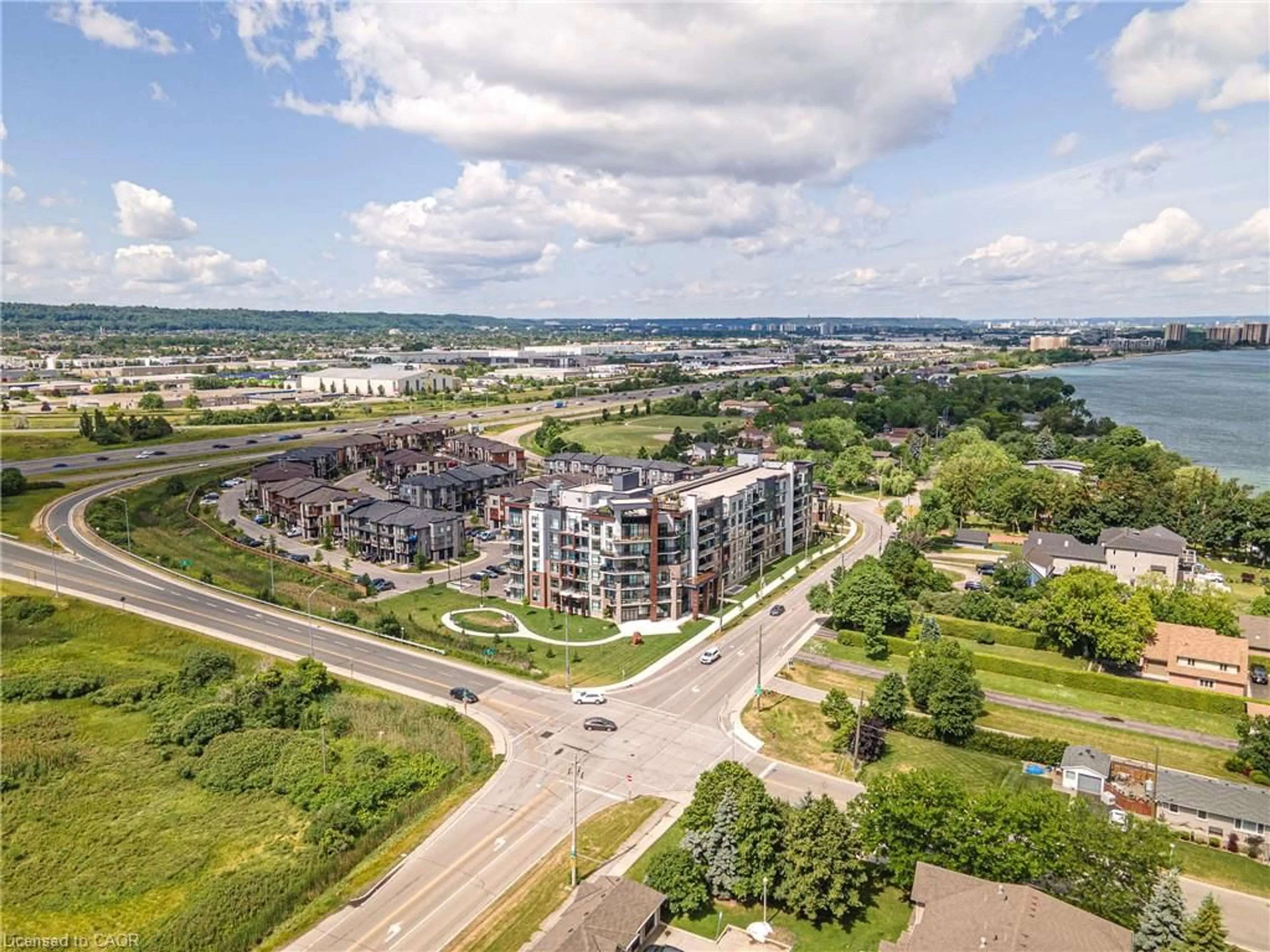 A pic from outside/outdoor area/front of a property/back of a property/a pic from drone, water/lake/river/ocean view for 600 North Service Rd #301, Stoney Creek Ontario L8E 0L2