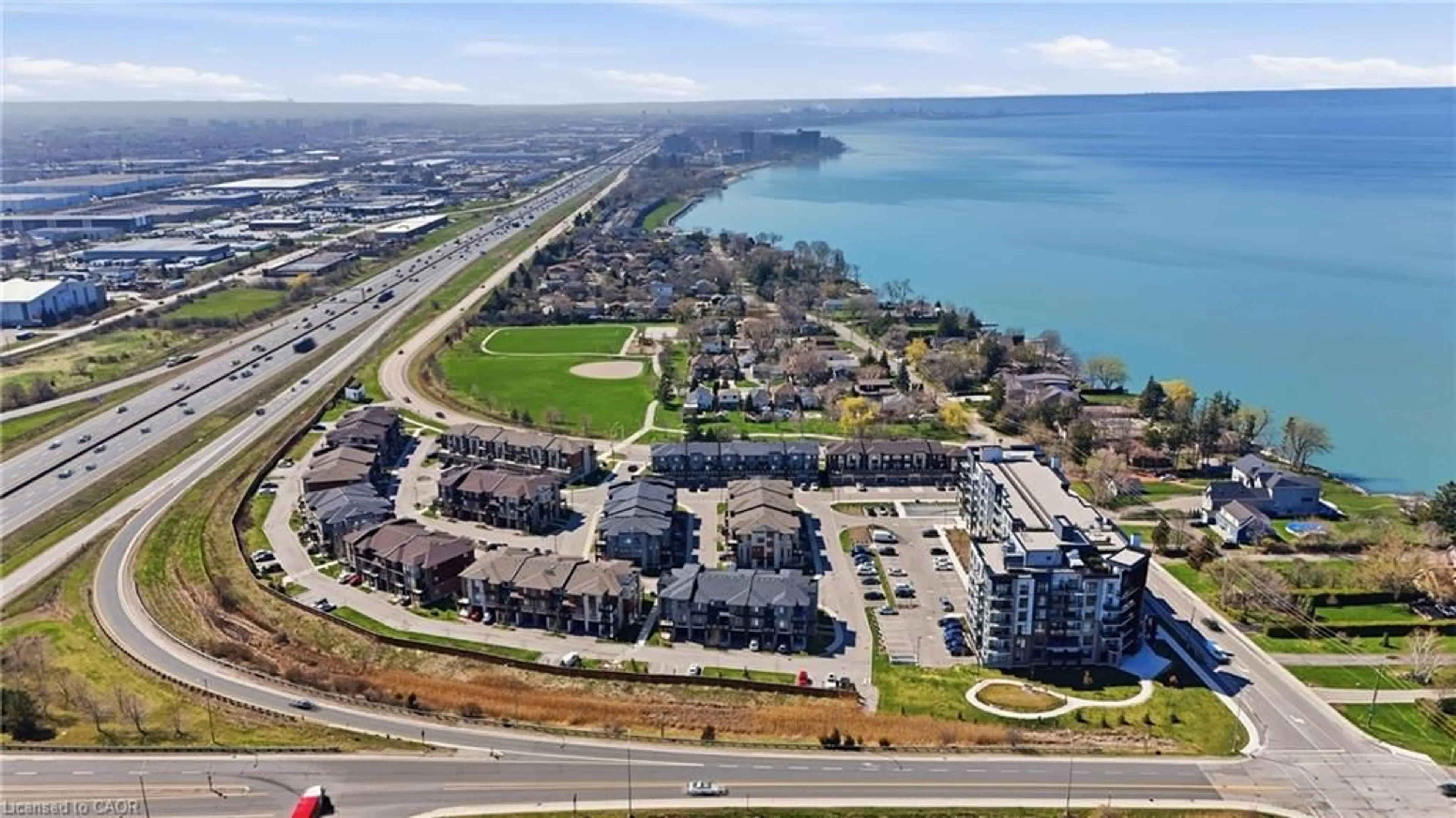 A pic from outside/outdoor area/front of a property/back of a property/a pic from drone, water/lake/river/ocean view for 600 North Service Rd #301, Stoney Creek Ontario L8E 0L2