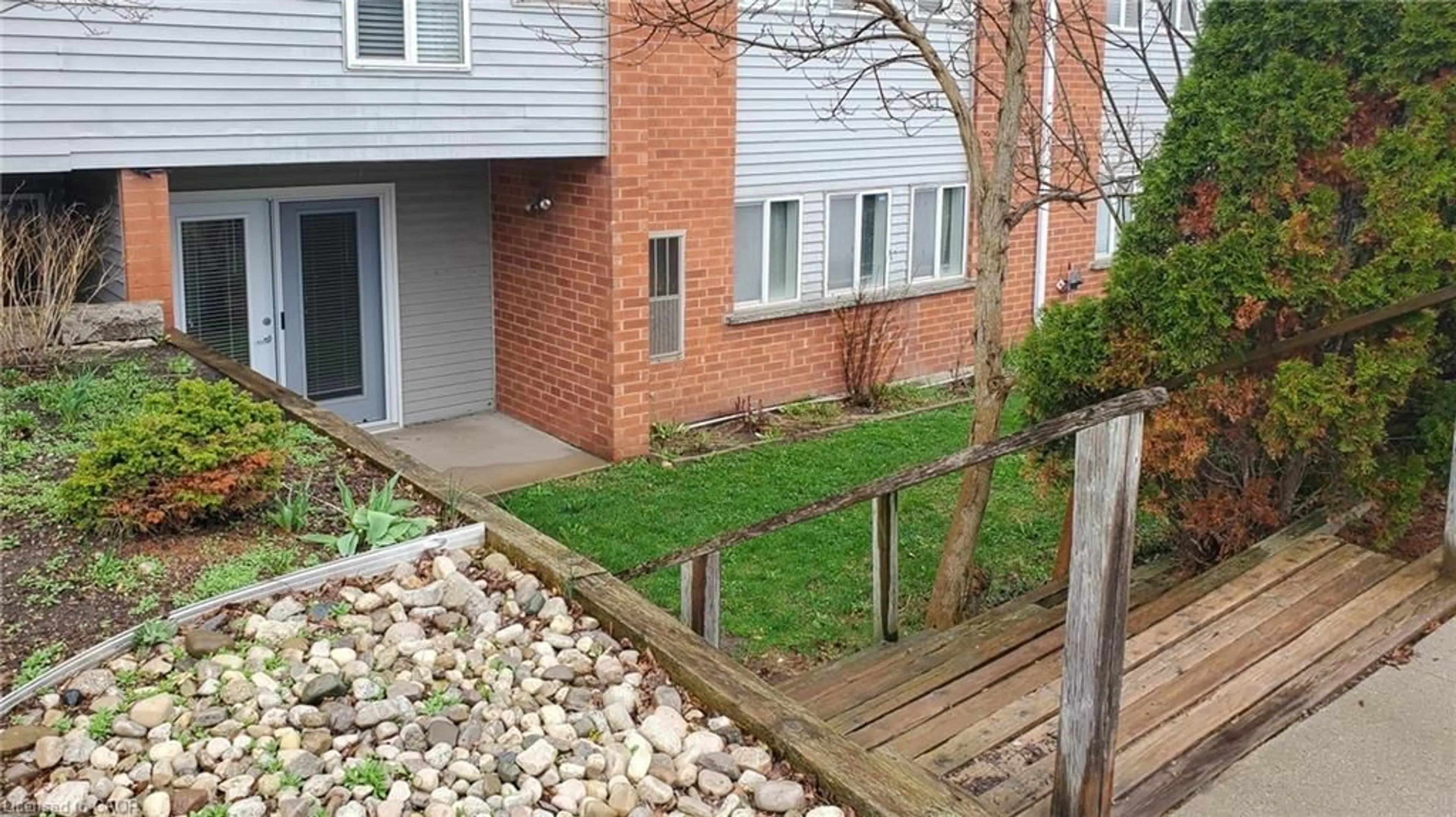 A pic from outside/outdoor area/front of a property/back of a property/a pic from drone, street for 500 Westmount Rd #103, Kitchener Ontario N2M 5M9
