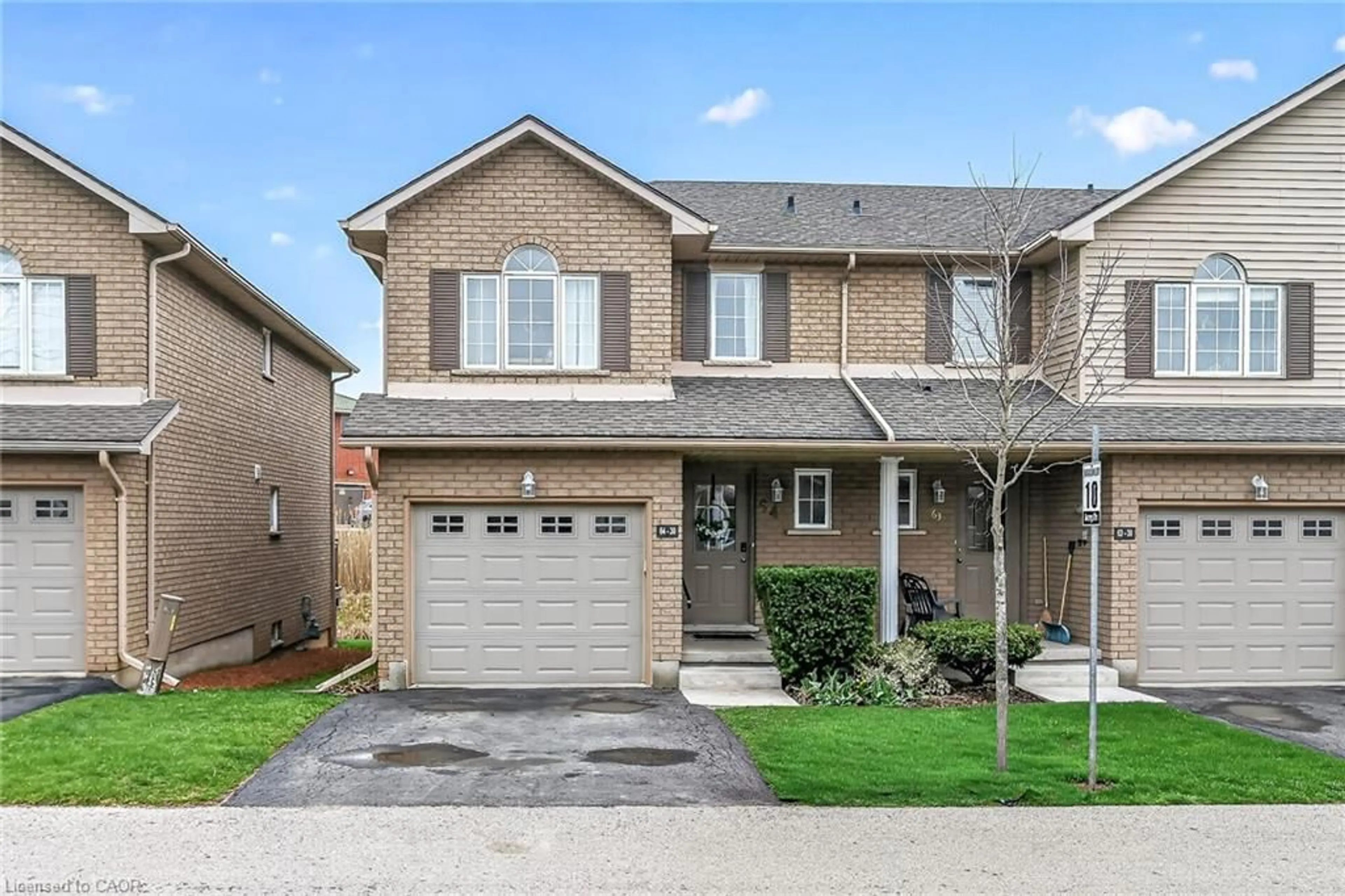 Home with brick exterior material, street for 30 Braemar Ave #64, Caledonia Ontario N3W 2M1