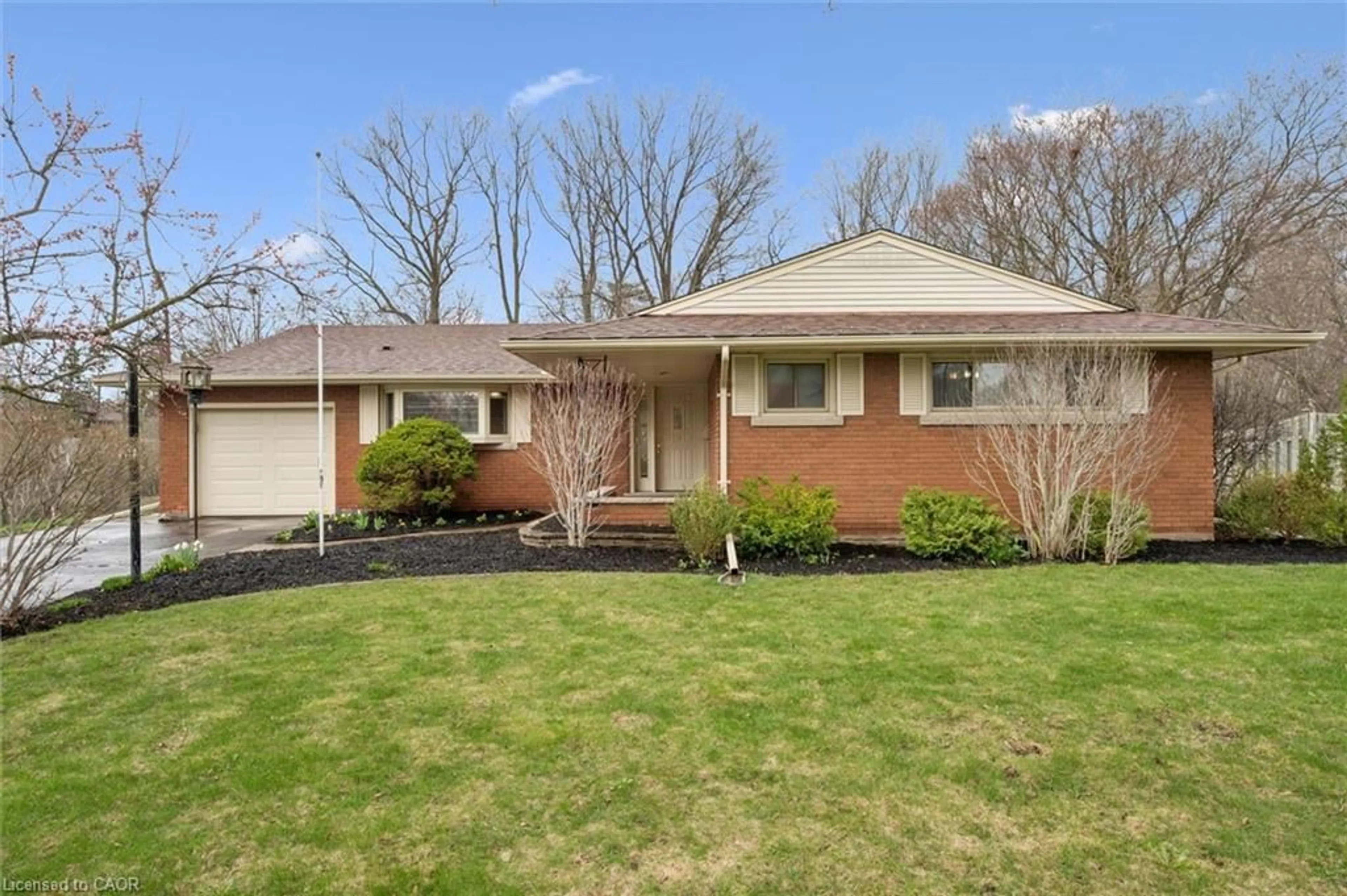 Home with brick exterior material, street for 30 Stonybrook Dr, Kitchener Ontario N2M 4L5