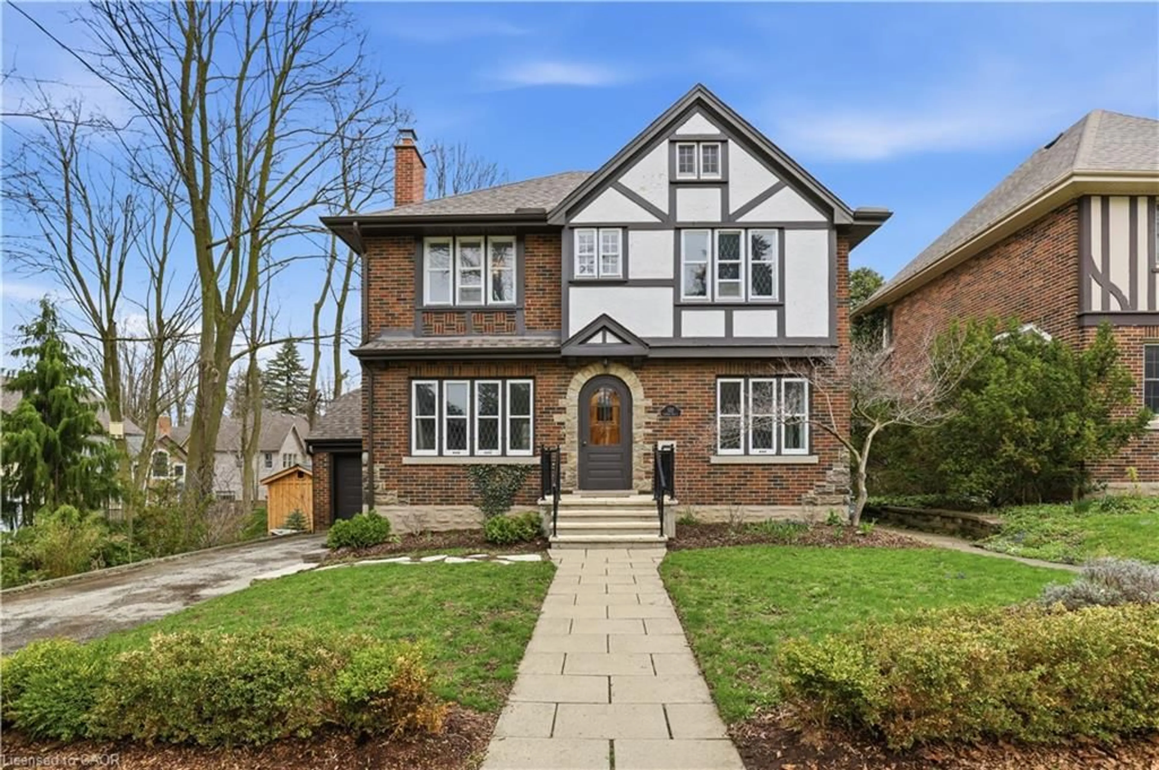 Home with brick exterior material, street for 122 Dunbar Rd, Waterloo Ontario N2L 2E7