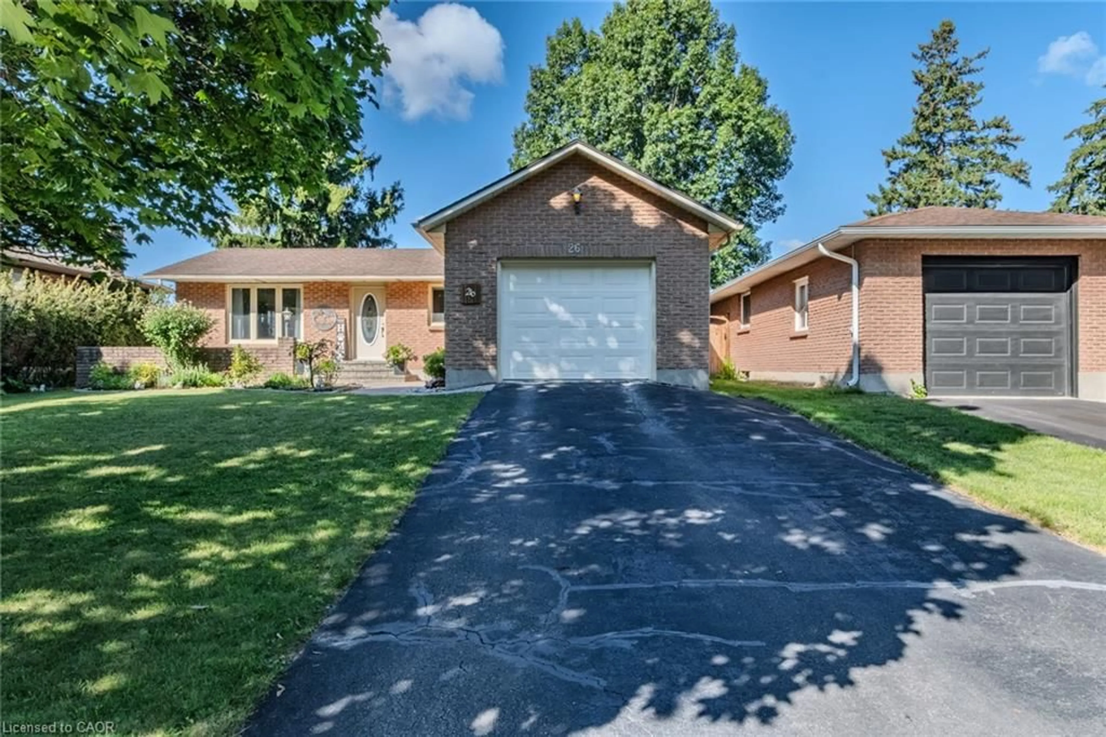 Home with brick exterior material, street for 26 Douglas Ave, Simcoe Ontario N3Y 4X4