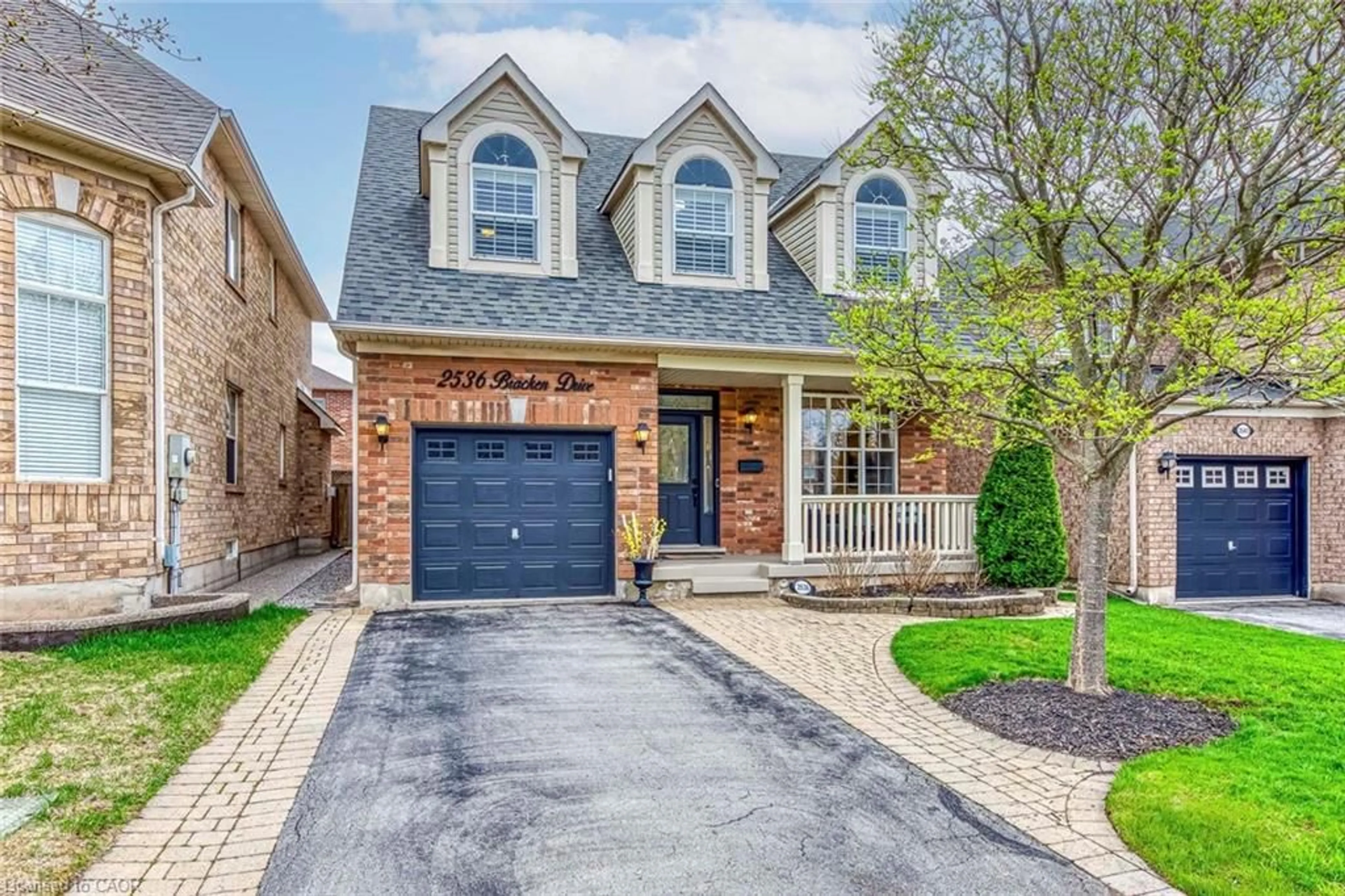 Home with brick exterior material, street for 2536 Bracken Dr, Oakville Ontario L6M 4R7