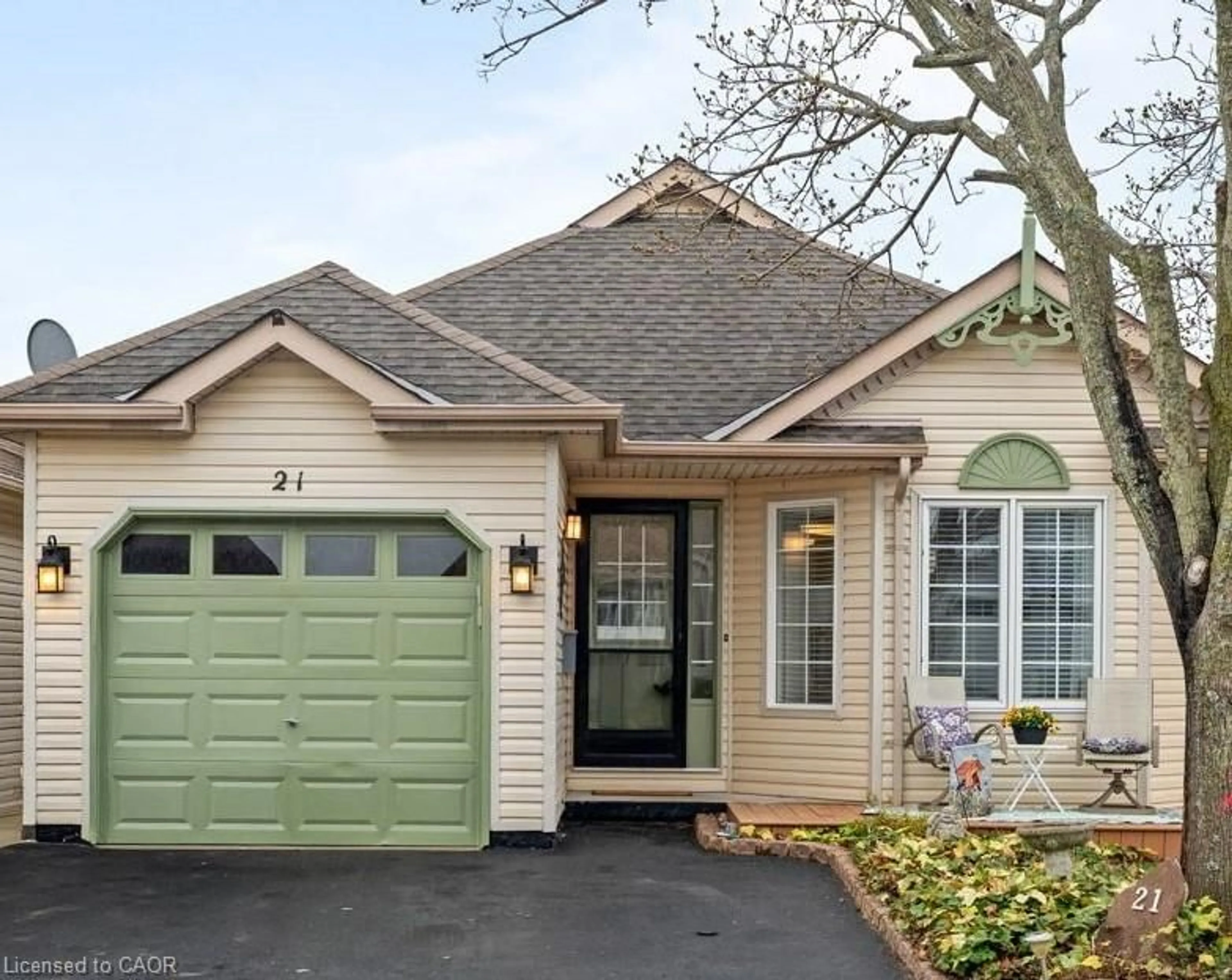 Home with vinyl exterior material, street for 21 Long Point Blvd, Port Rowan Ontario N0E 1M0