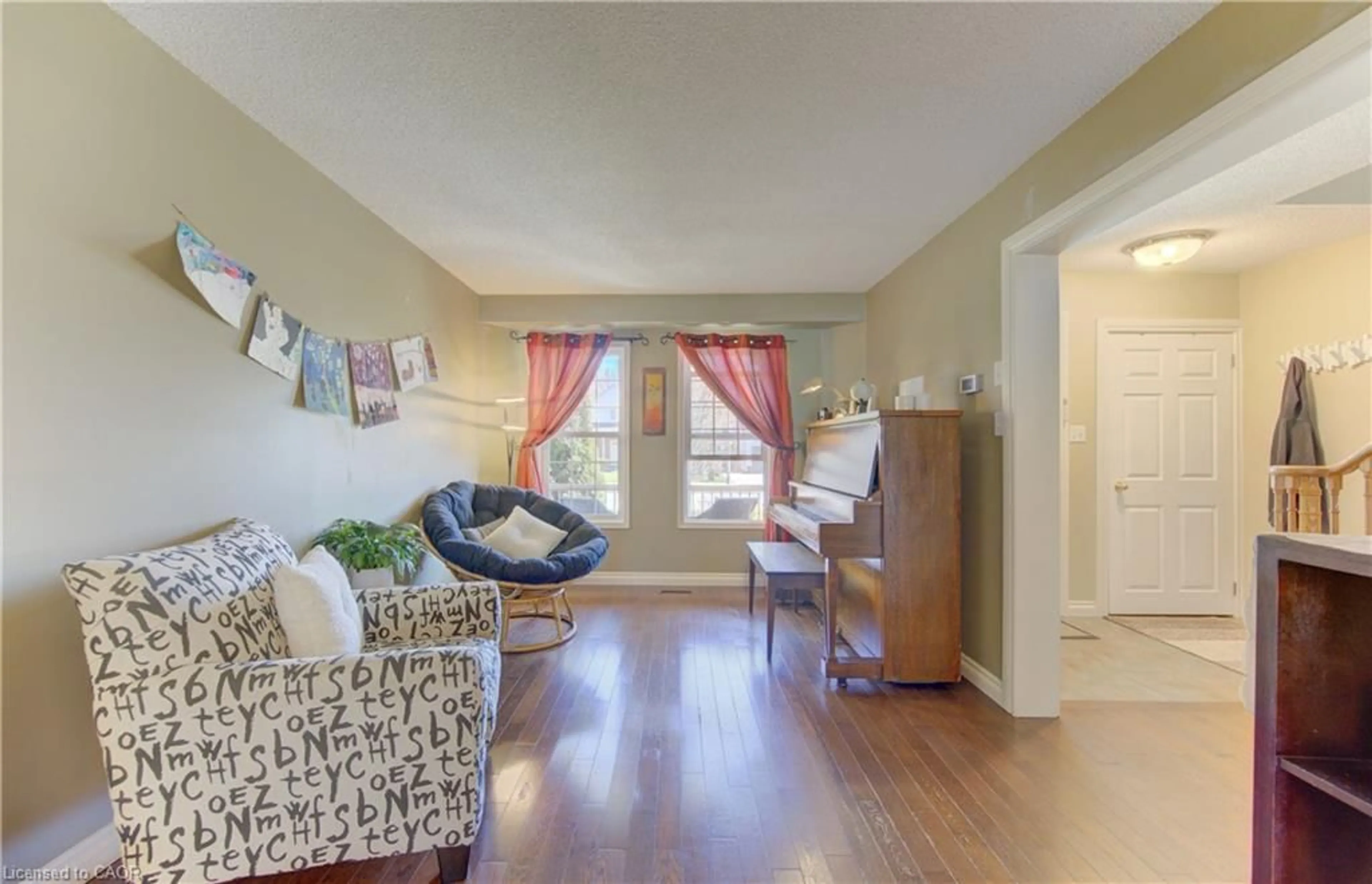 Living room with furniture, wood/laminate floor for 19 Broom St, Ayr Ontario N0B 1E0