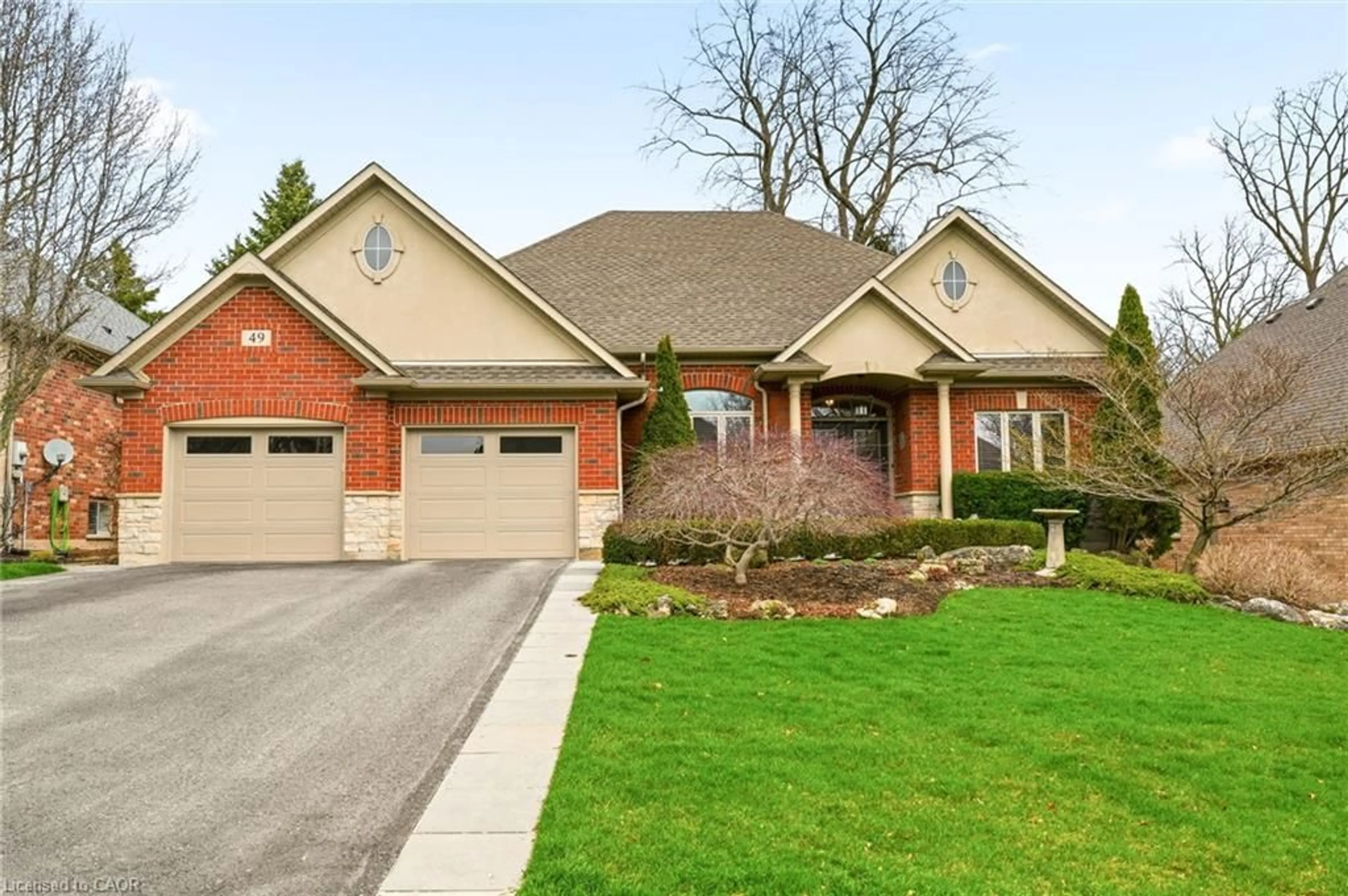 Home with brick exterior material, street for 49 Rockcliffe Rd, Waterdown Ontario L9H 7H5