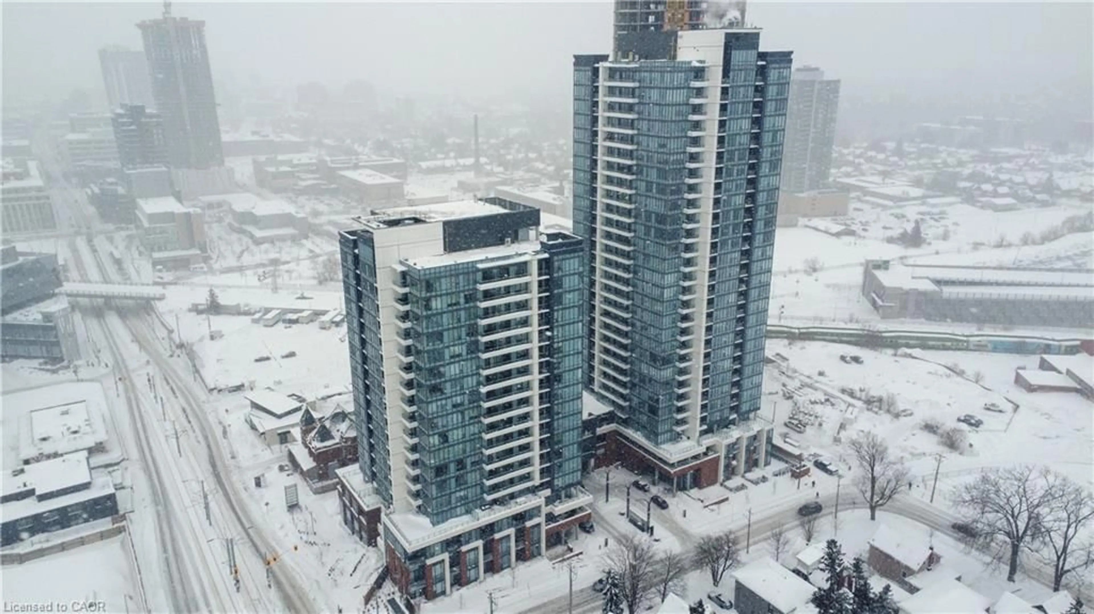 A pic from outside/outdoor area/front of a property/back of a property/a pic from drone, city buildings view from balcony for 15 Wellington St #2705, Kitchener Ontario N3G 0E4