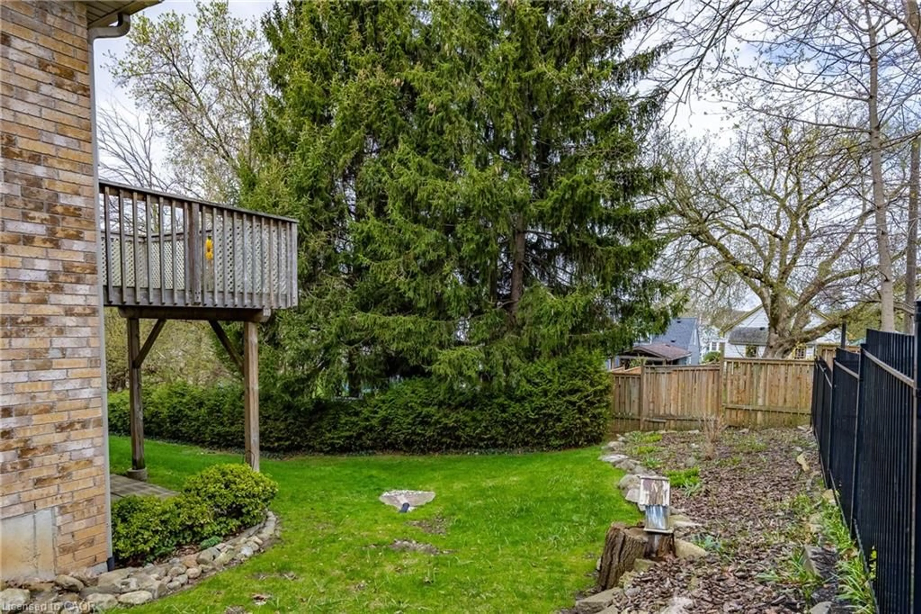Patio, forest/trees view for 93 Elmhurst Ave #8, Simcoe Ontario N3Y 3G1