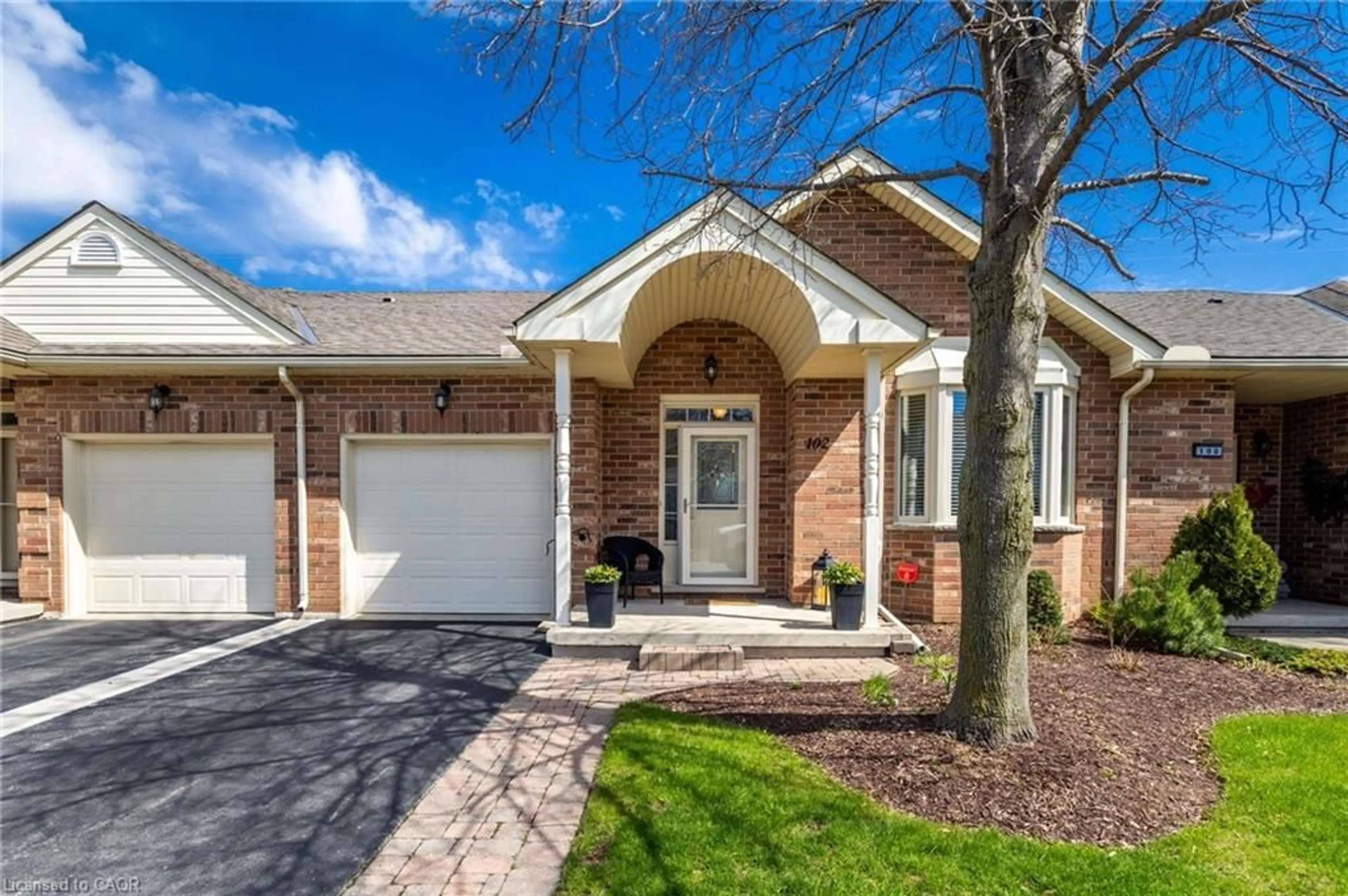 Home with brick exterior material, street for 102 Northernbreeze St, Mount Hope Ontario L0R 1W0