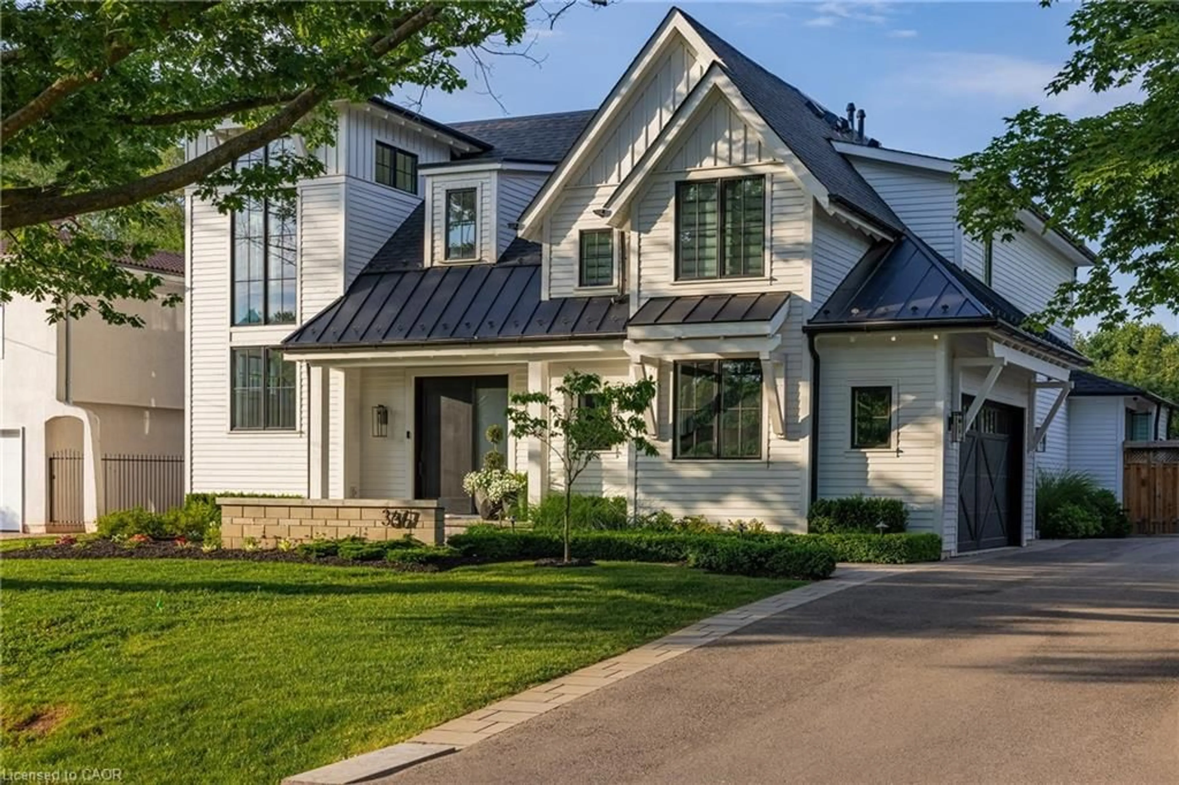 Home with brick exterior material, street for 367 Seaton Dr, Oakville Ontario L6L 3X9