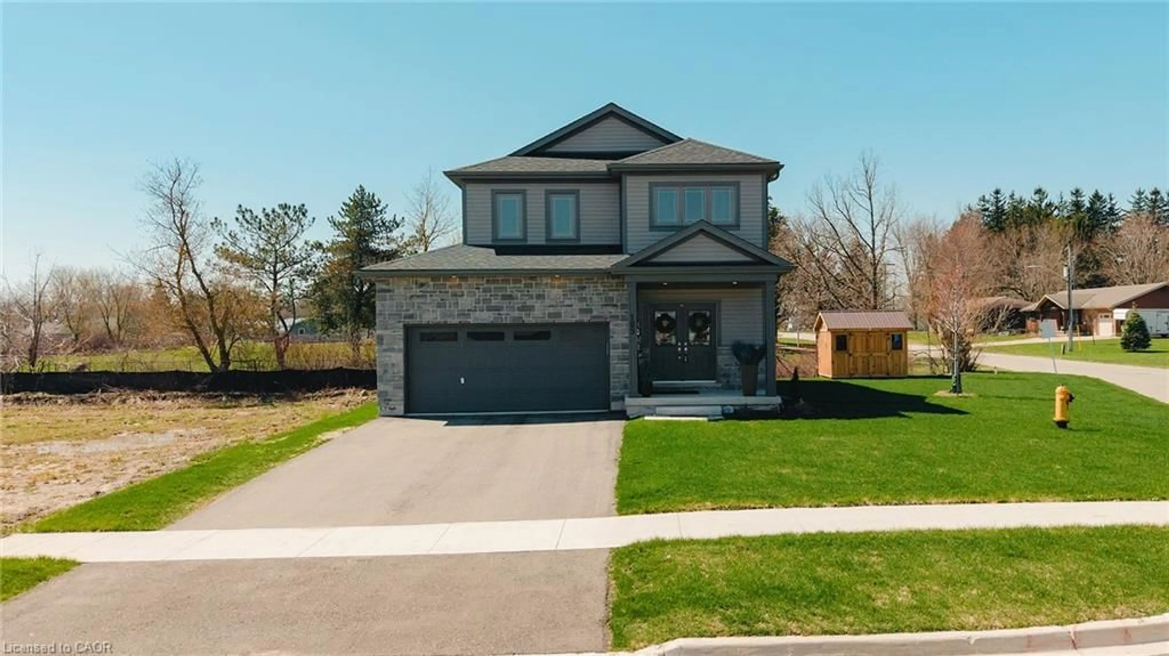 Home with brick exterior material, street for 109 Ballantyne Ave, Atwood Ontario N0G 1B0