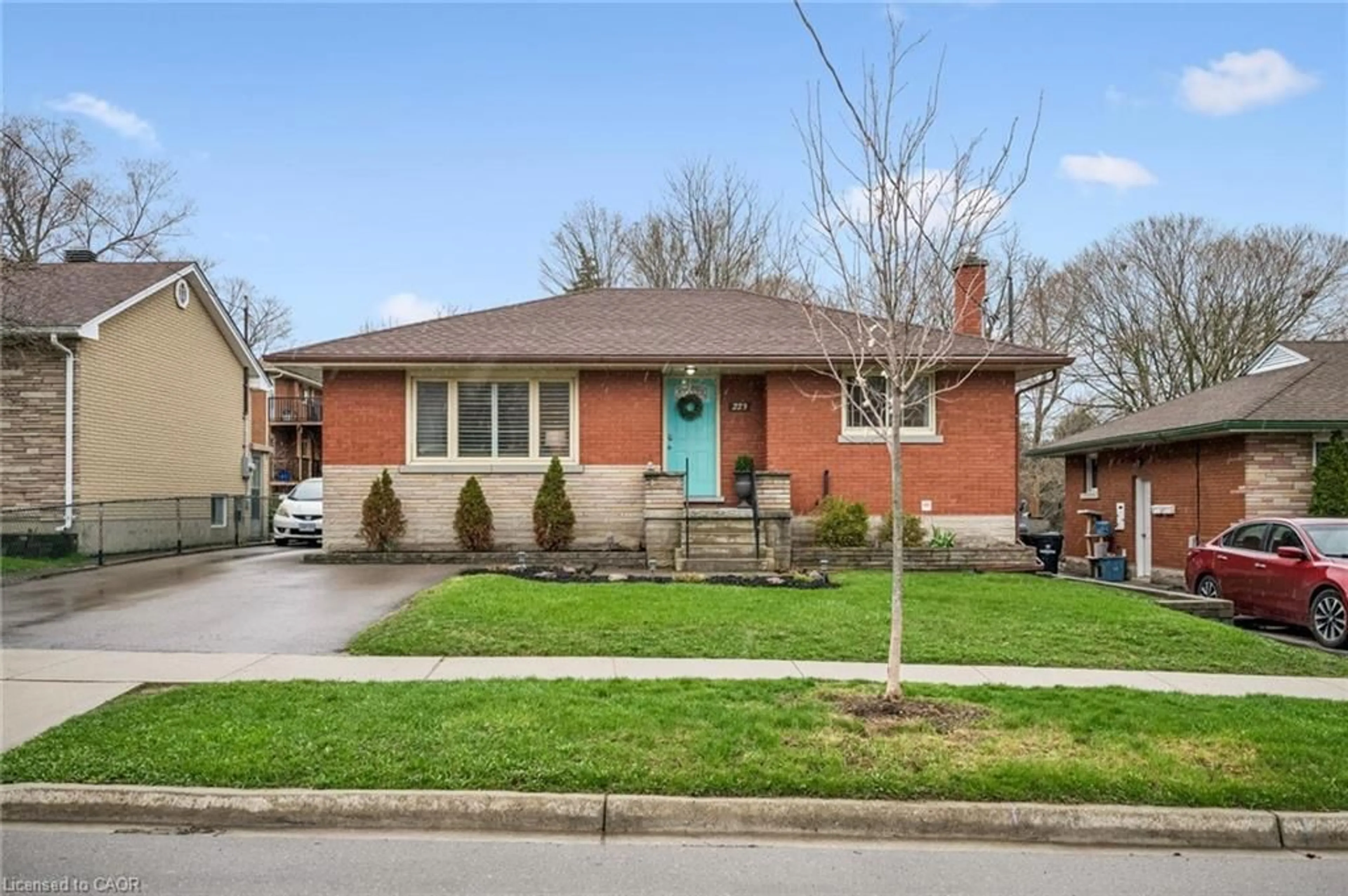Home with brick exterior material, street for 223 Connaught St, Kitchener Ontario N2C 1B2