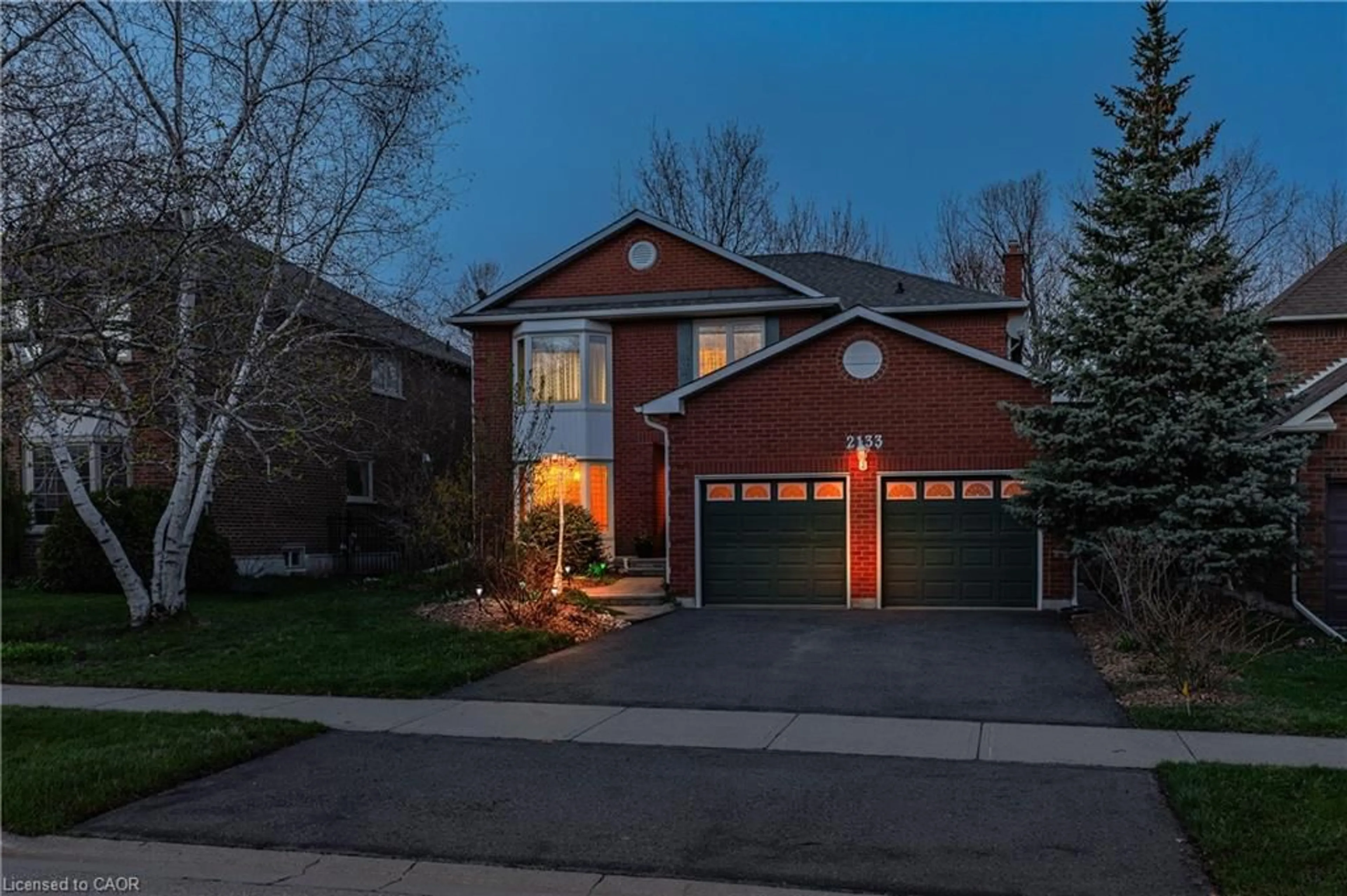 Home with brick exterior material, street for 2133 Grand Blvd, Oakville Ontario L6H 5M3