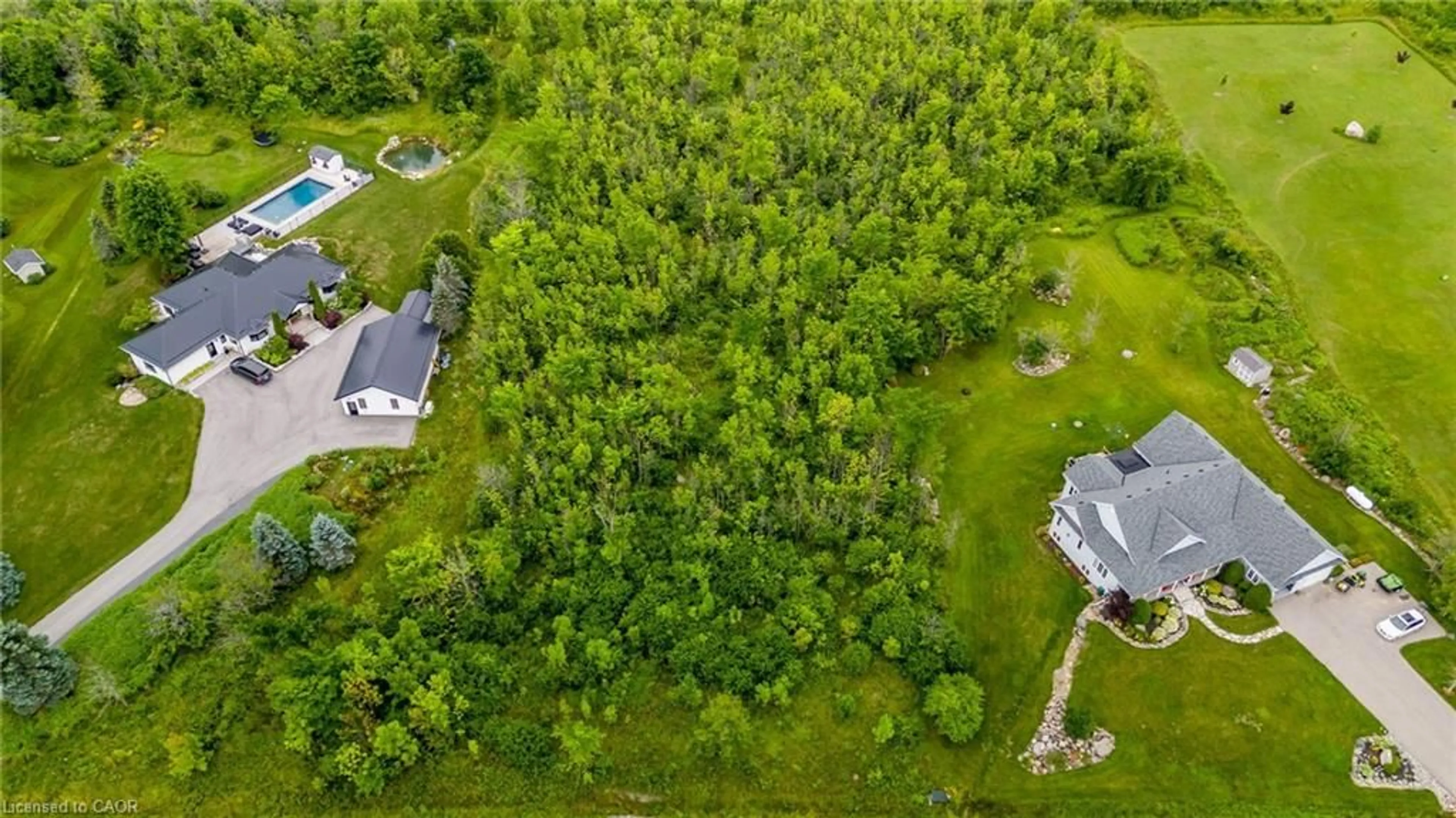 A pic from outside/outdoor area/front of a property/back of a property/a pic from drone, forest/trees view for 106 Ridgecrest Lane, Meaford Municipality Ontario N4L 1W6