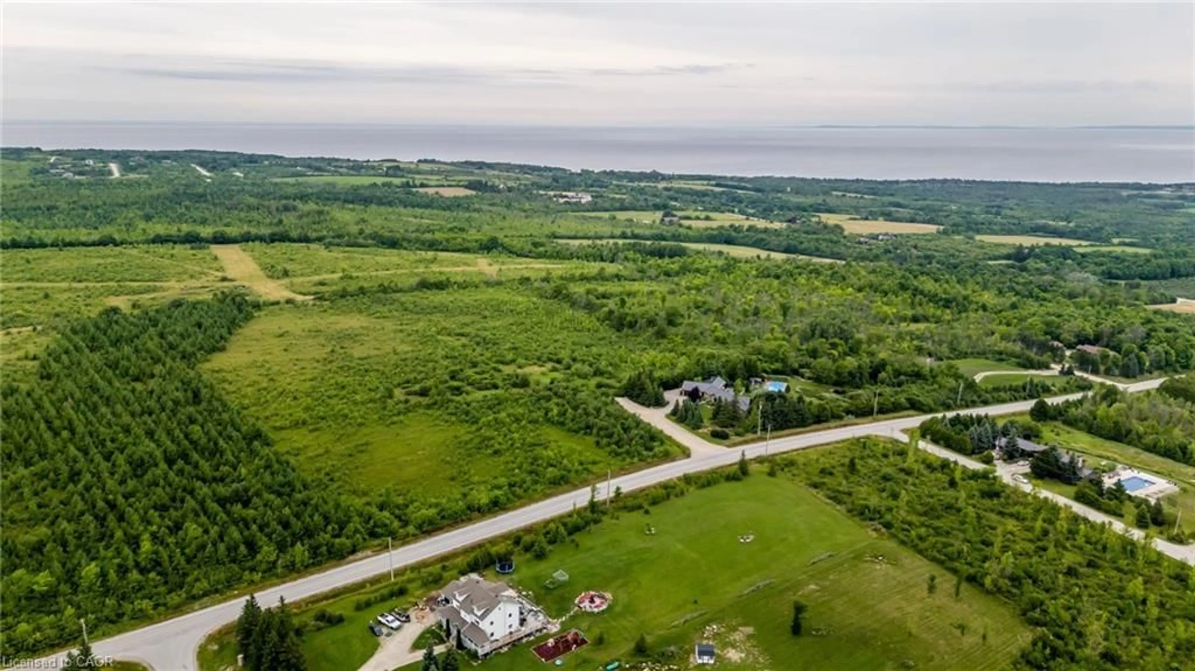 A pic from outside/outdoor area/front of a property/back of a property/a pic from drone, water/lake/river/ocean view for 106 Ridgecrest Lane, Meaford Municipality Ontario N4L 1W6