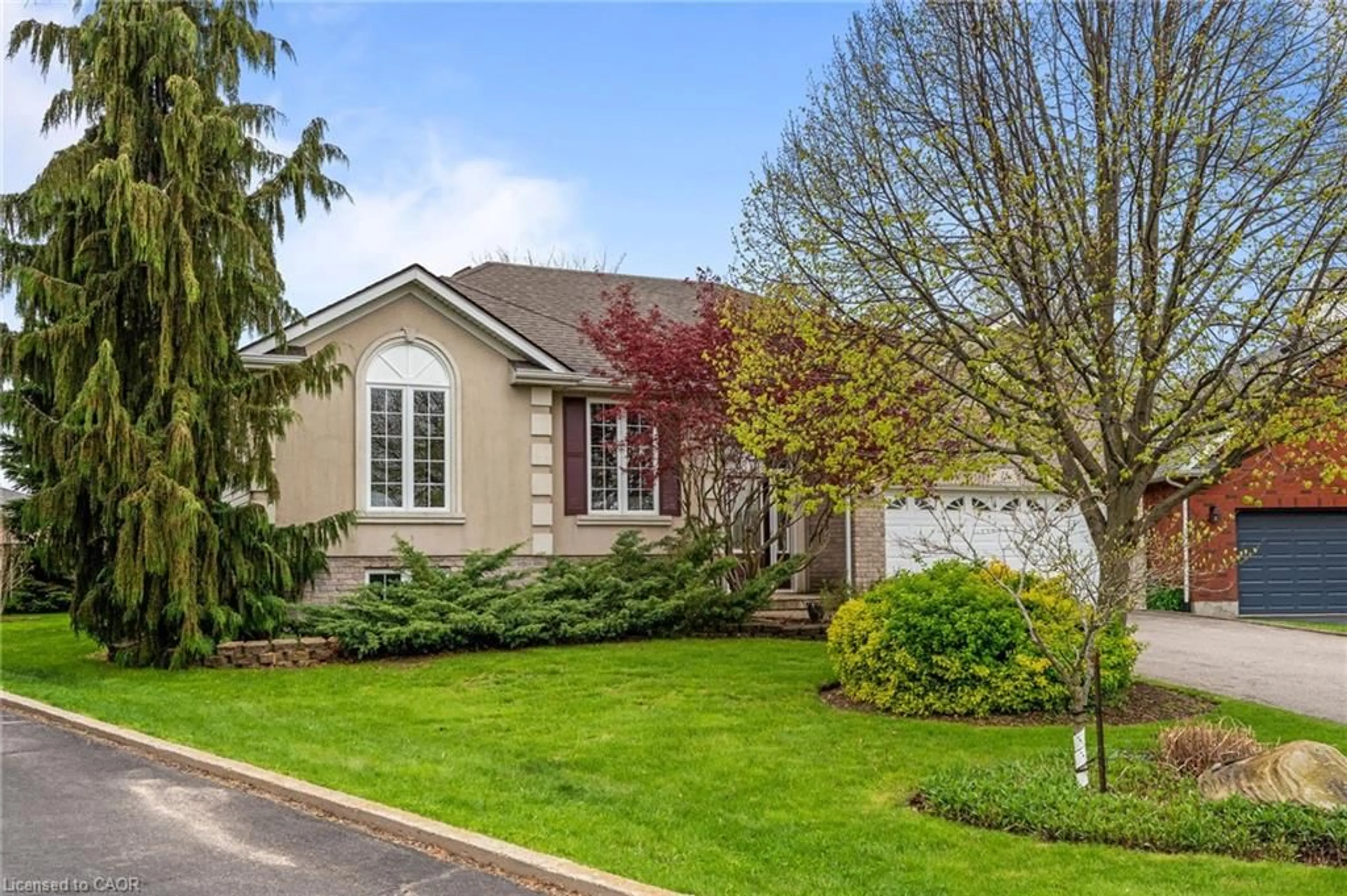 Home with vinyl exterior material, street for 16 Macpherson Dr, Paris Ontario N3L 4B6