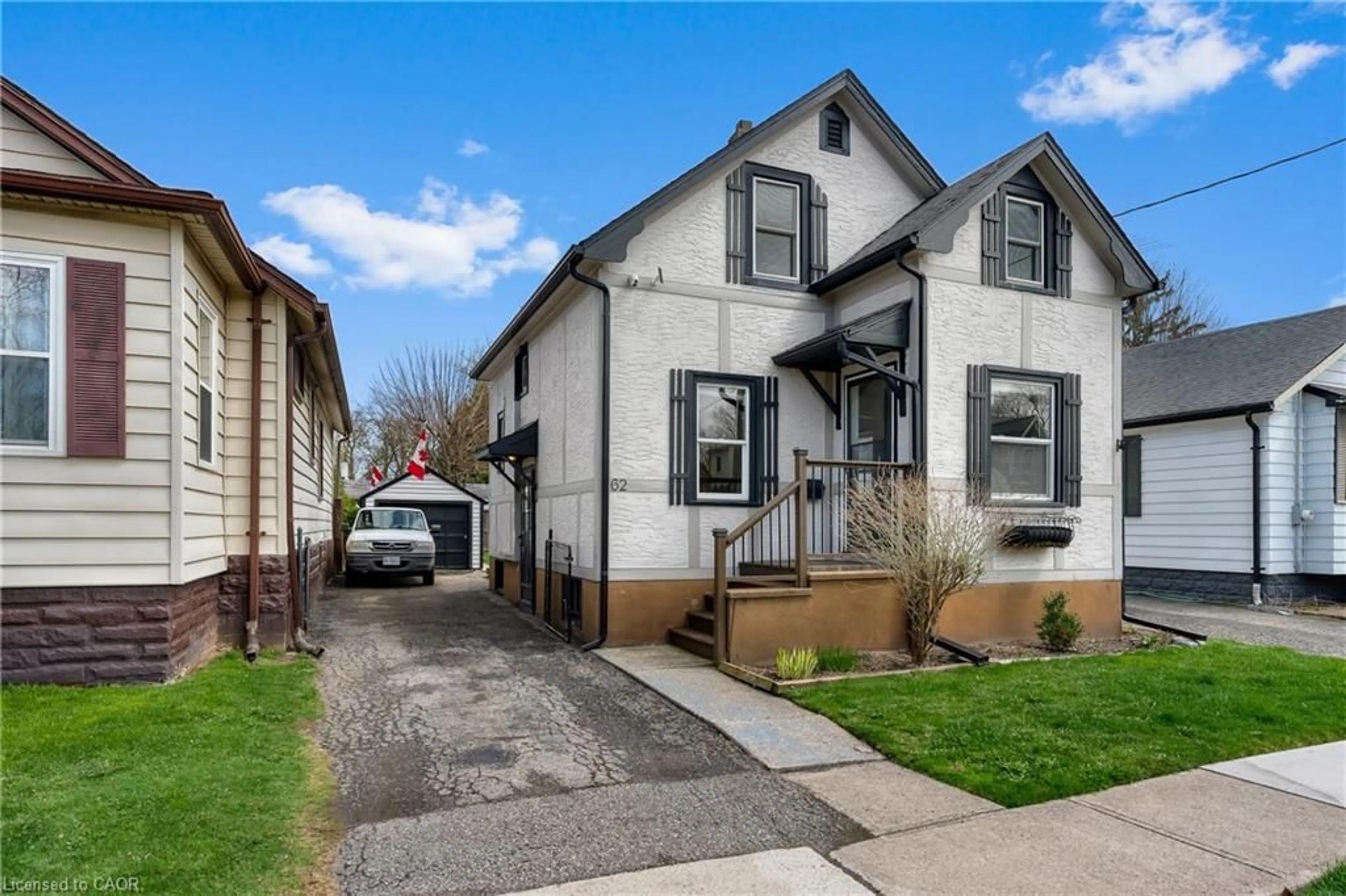 Home with vinyl exterior material, street for 62 Rolls Ave, St. Catharines Ontario L2N 1W1