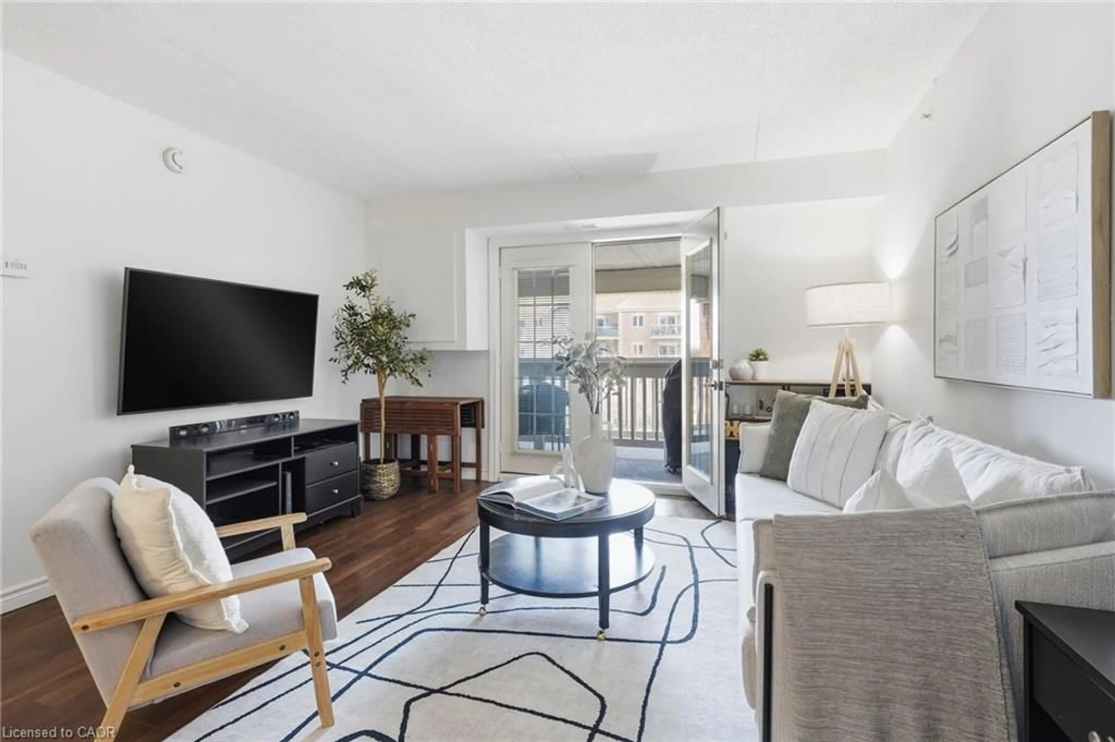 Living room with furniture, unknown for 4015 Kilmer Dr #308, Burlington Ontario L7M 4M4