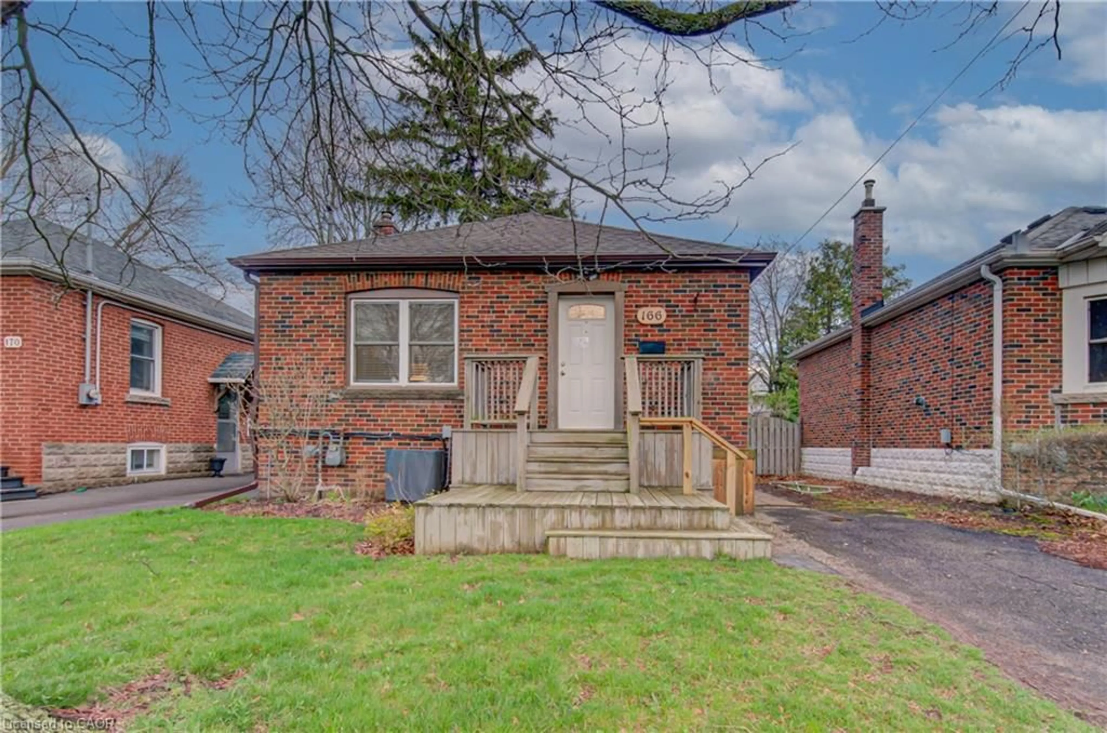 Home with brick exterior material, street for 166 Bond St, Hamilton Ontario L8S 3W6