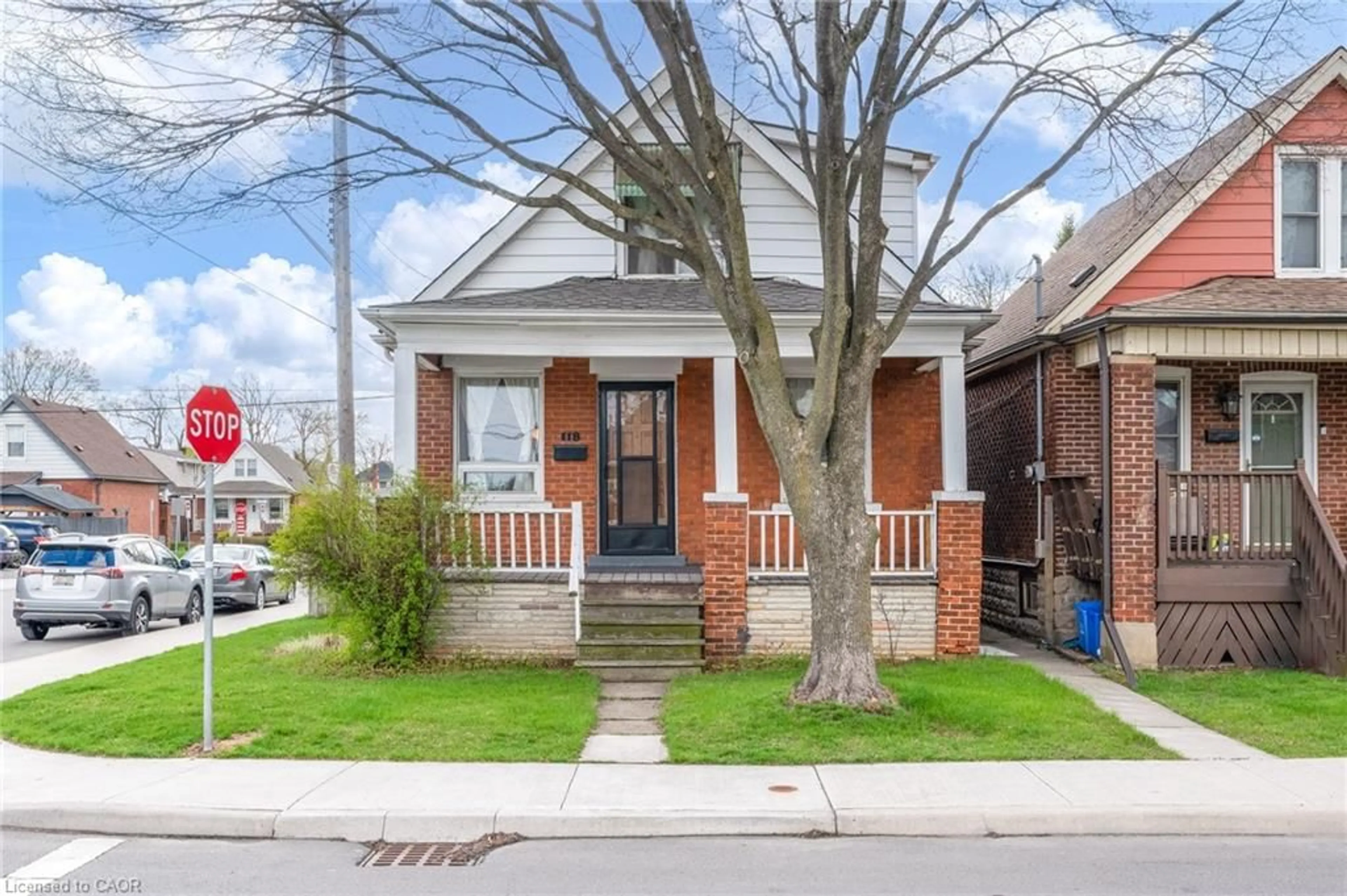 Home with brick exterior material, street for 118 Cameron Ave, Hamilton Ontario L8H 4Z2