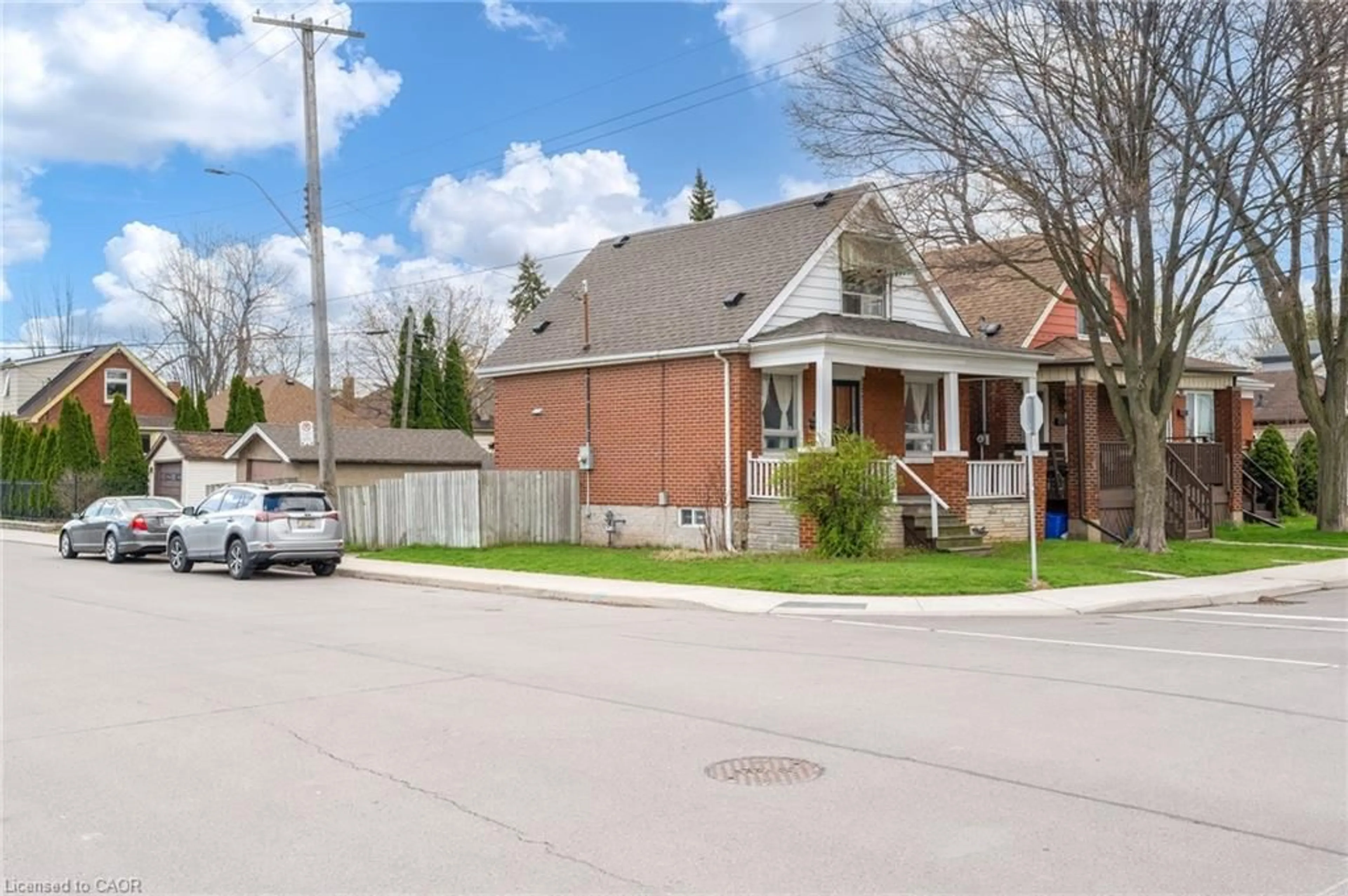 Home with brick exterior material, street for 118 Cameron Ave, Hamilton Ontario L8H 4Z2