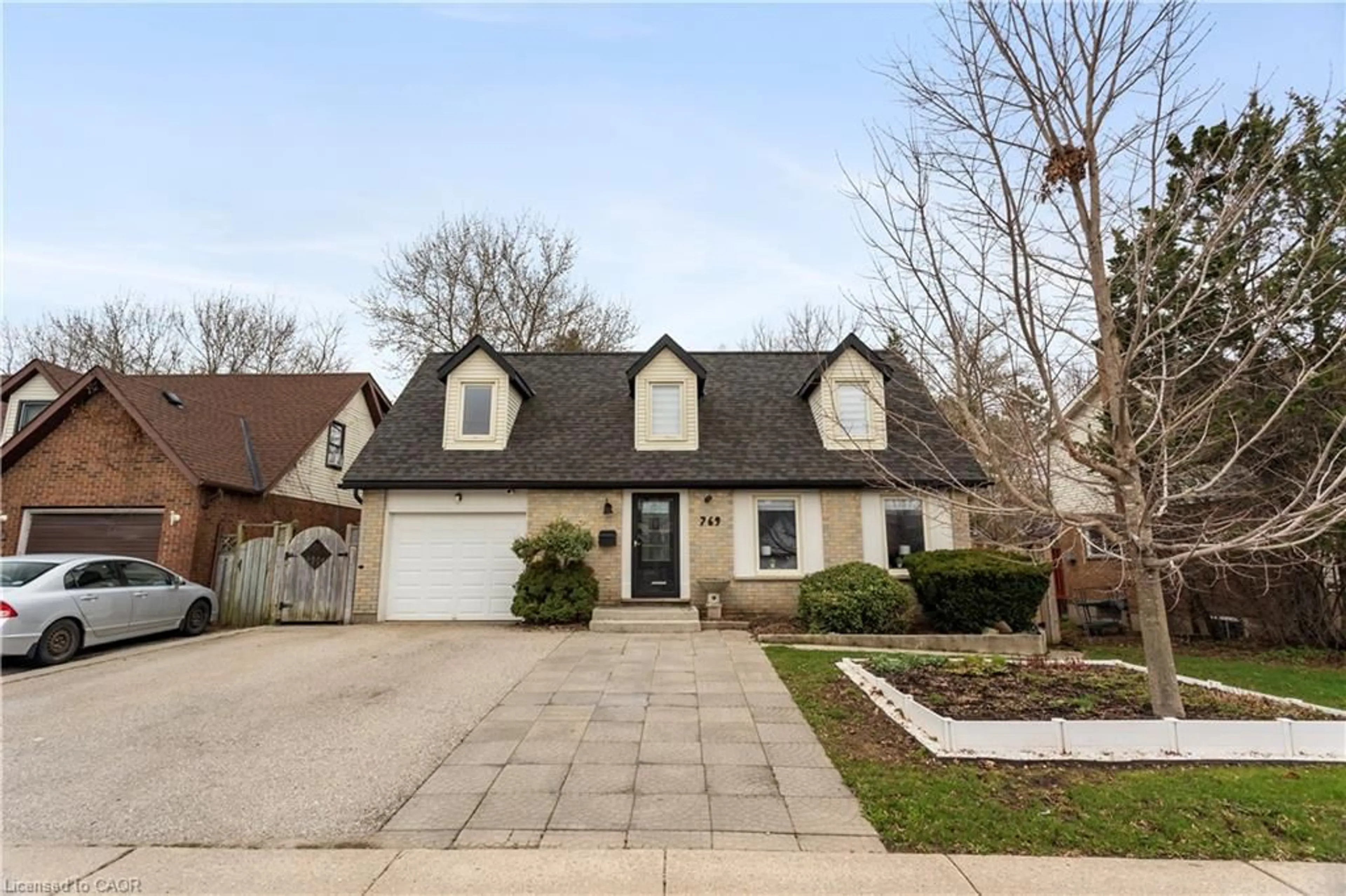 Home with brick exterior material, street for 769 Scottsdale Dr, Guelph Ontario N1G 3N7