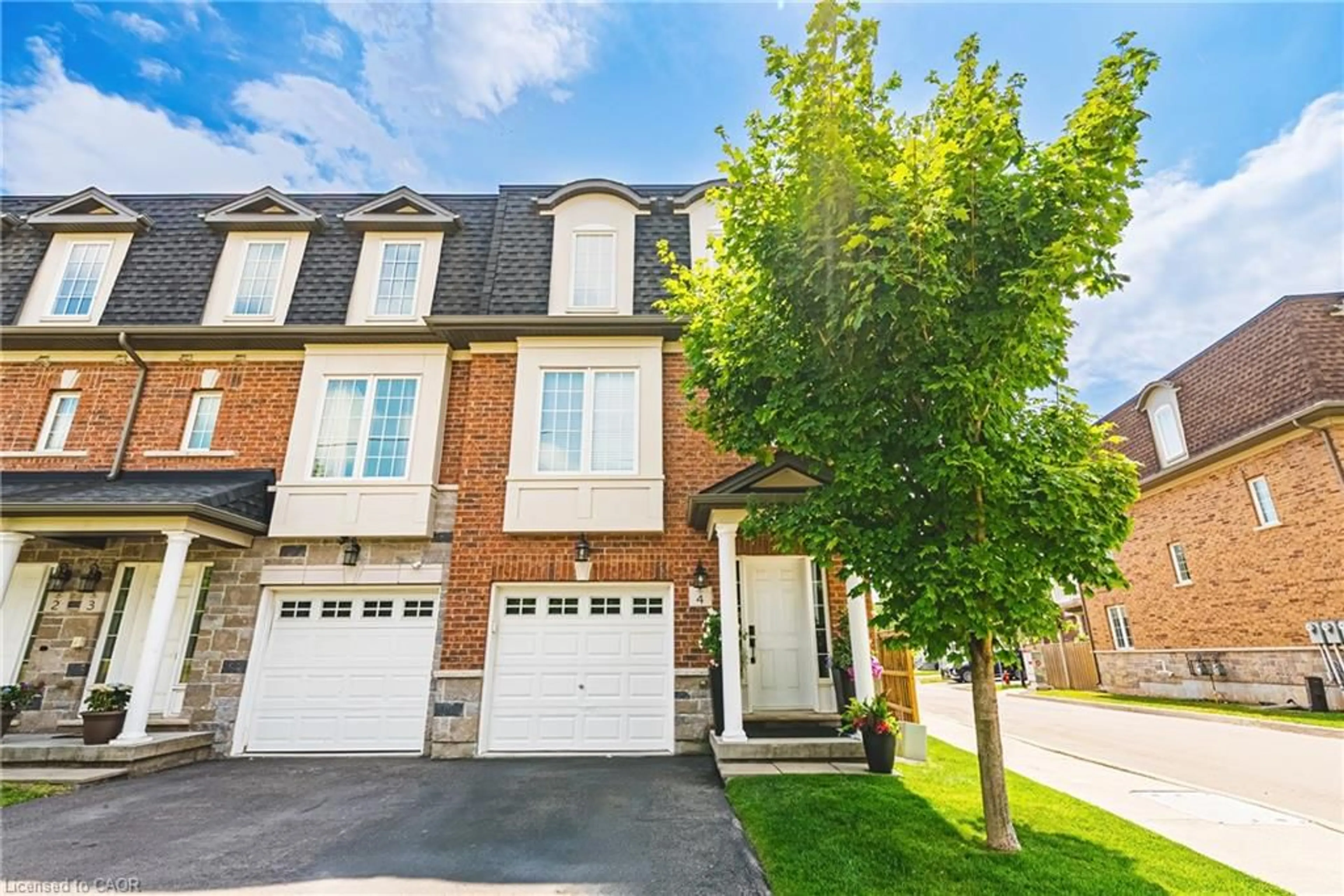 Home with brick exterior material, street for 2220 Queensway Dr #4, Burlington Ontario L7R 0E7
