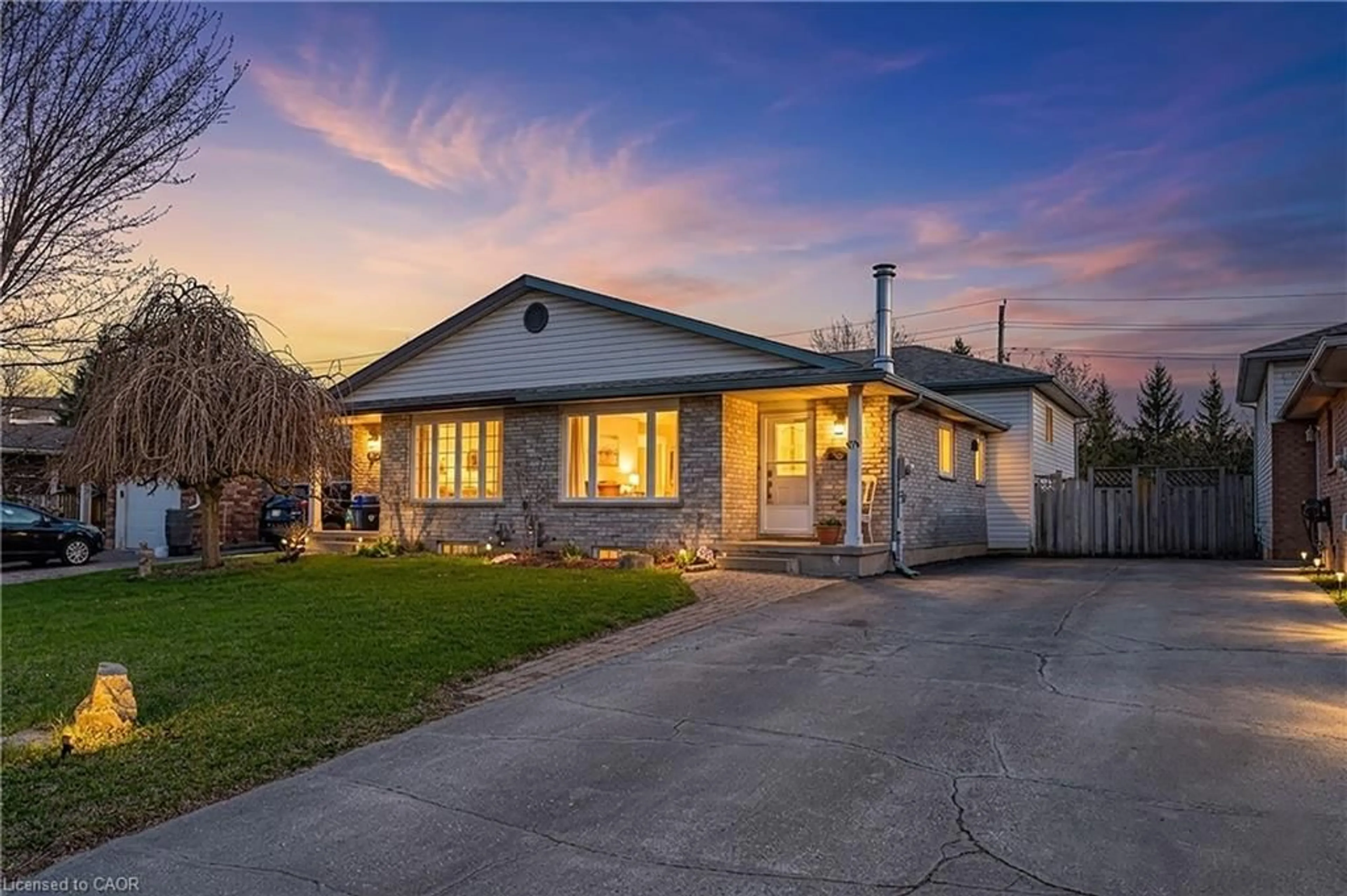 Home with brick exterior material, street for 48 Tamvale Cres, Kitchener Ontario N2E 3K7