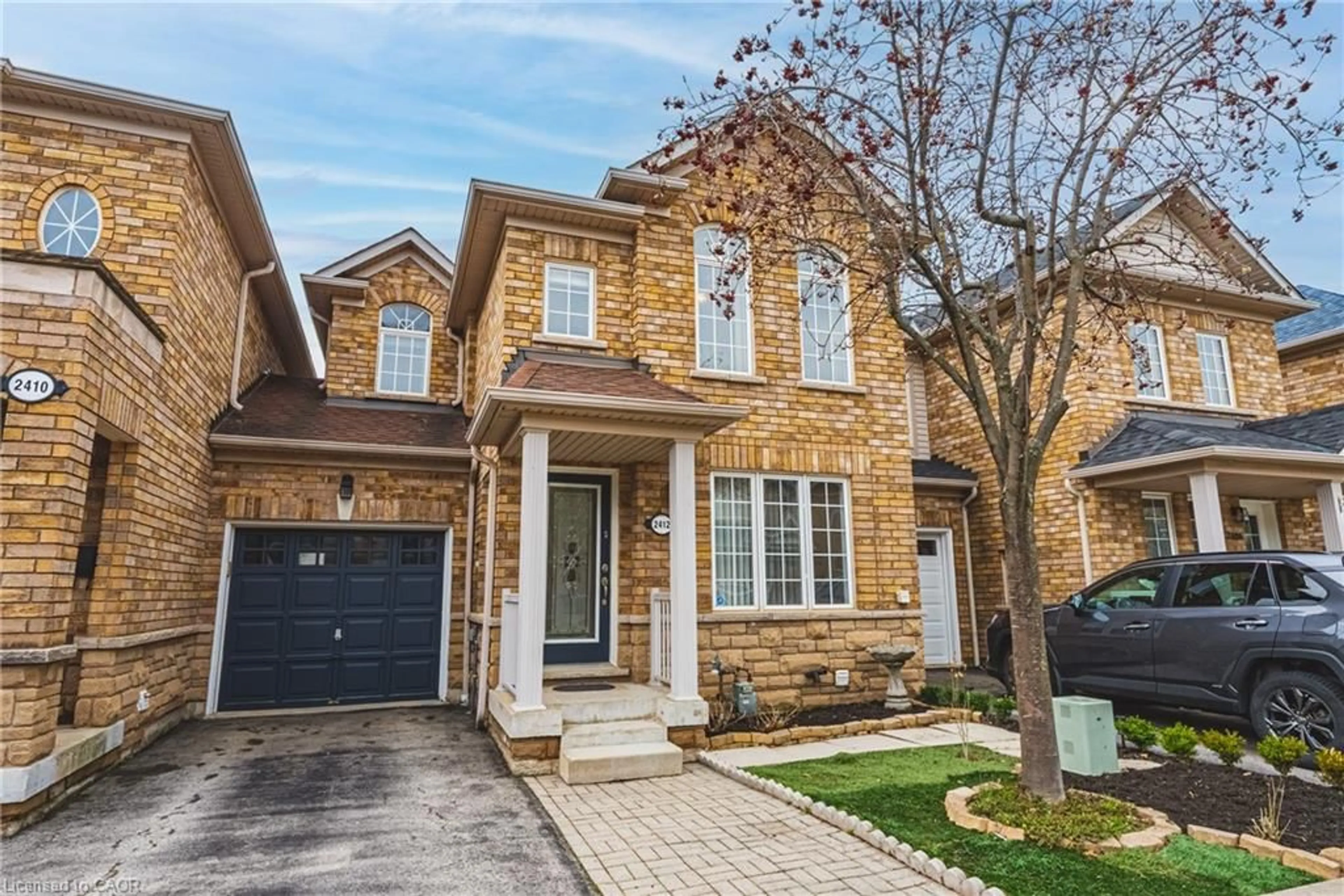 Home with brick exterior material, street for 2412 Curtis Rd, Burlington Ontario L7L 7M3