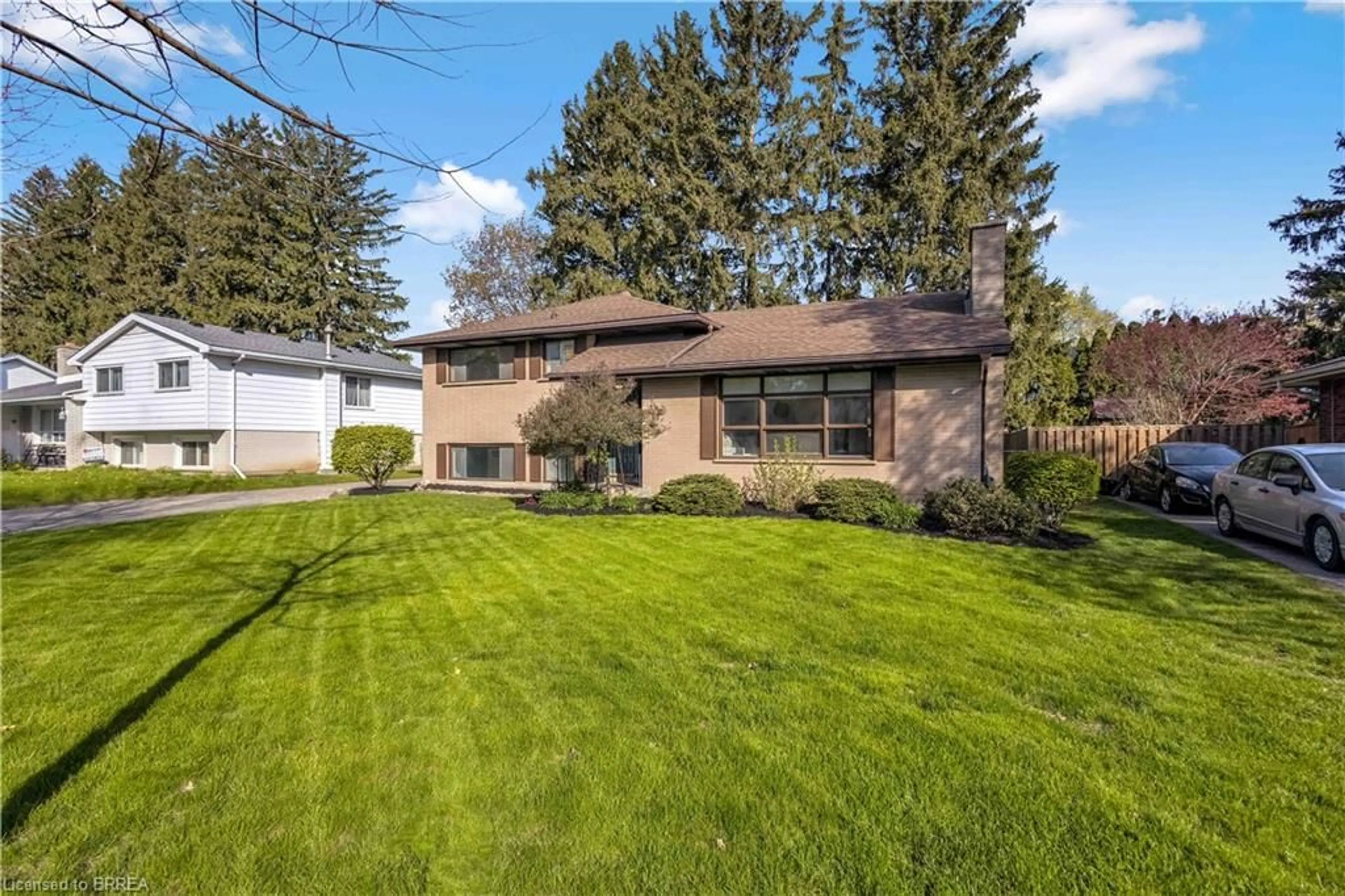 Home with vinyl exterior material, street for 82 Forsythe Ave, Brantford Ontario N3R 3L8