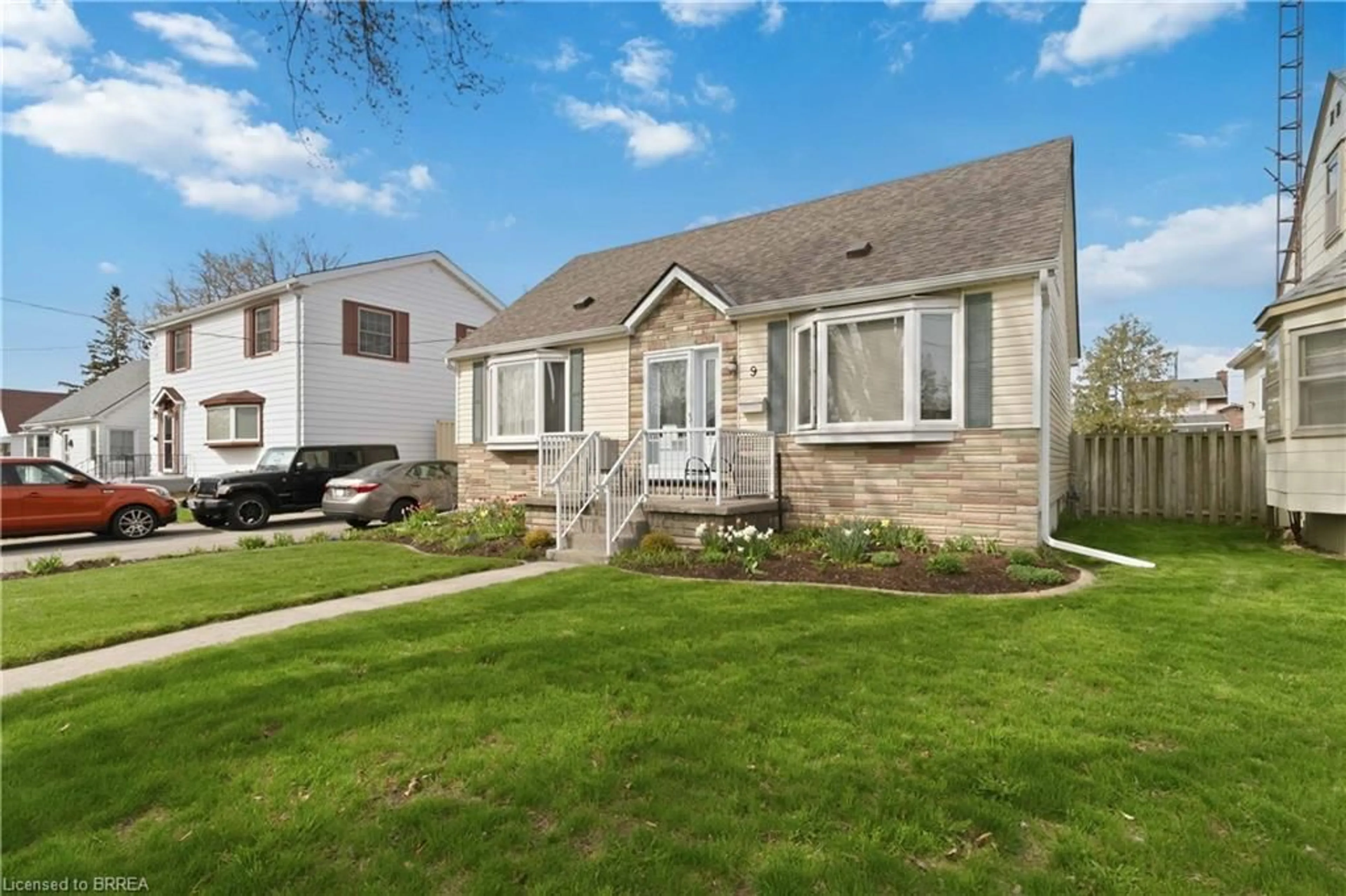 Home with vinyl exterior material, street for 9 Sussex Ave, Brantford Ontario N3R 2G5