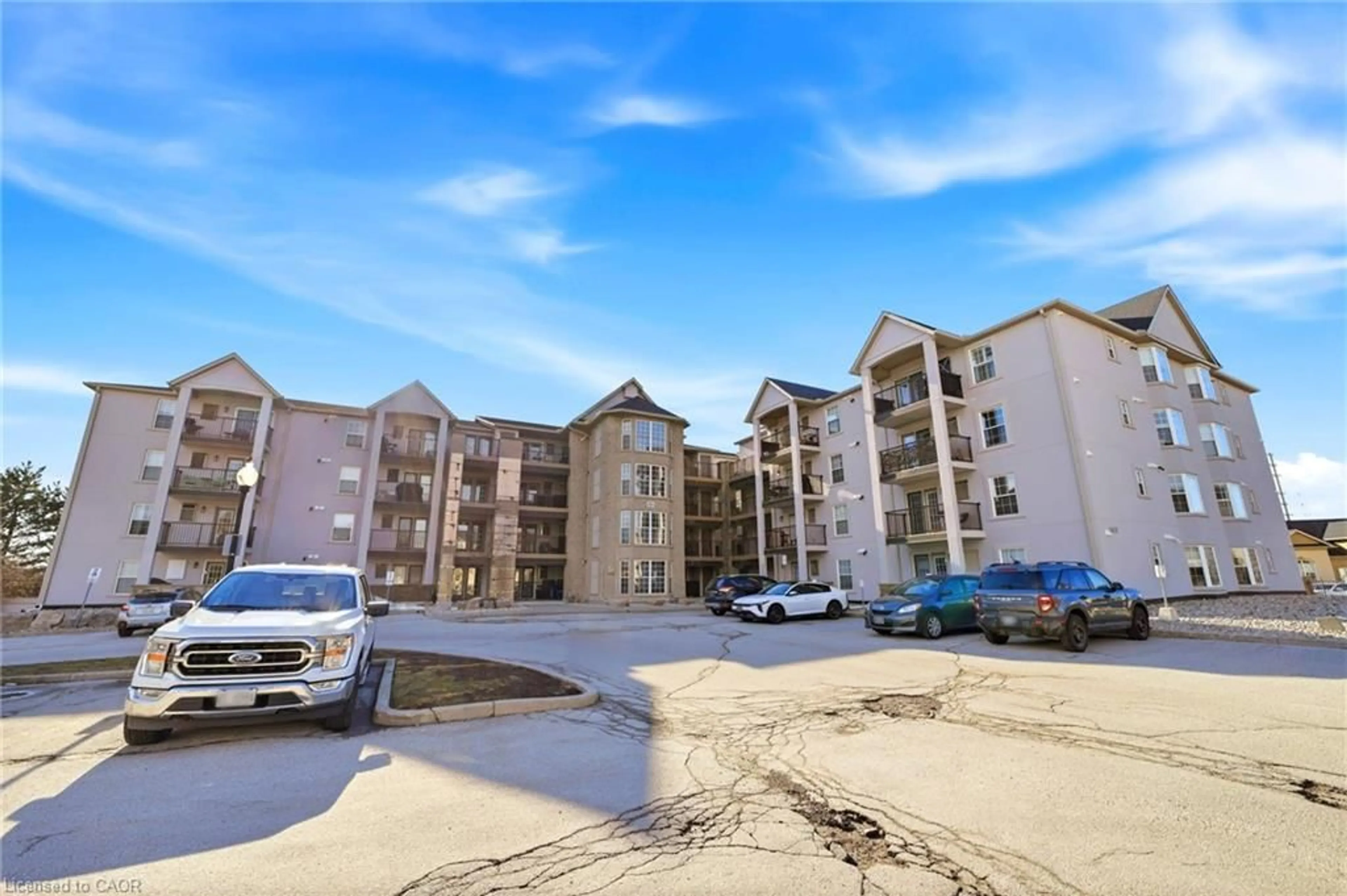 A pic from outside/outdoor area/front of a property/back of a property/a pic from drone, building for 1411 Walkers Line #308, Burlington Ontario L7M 4P5