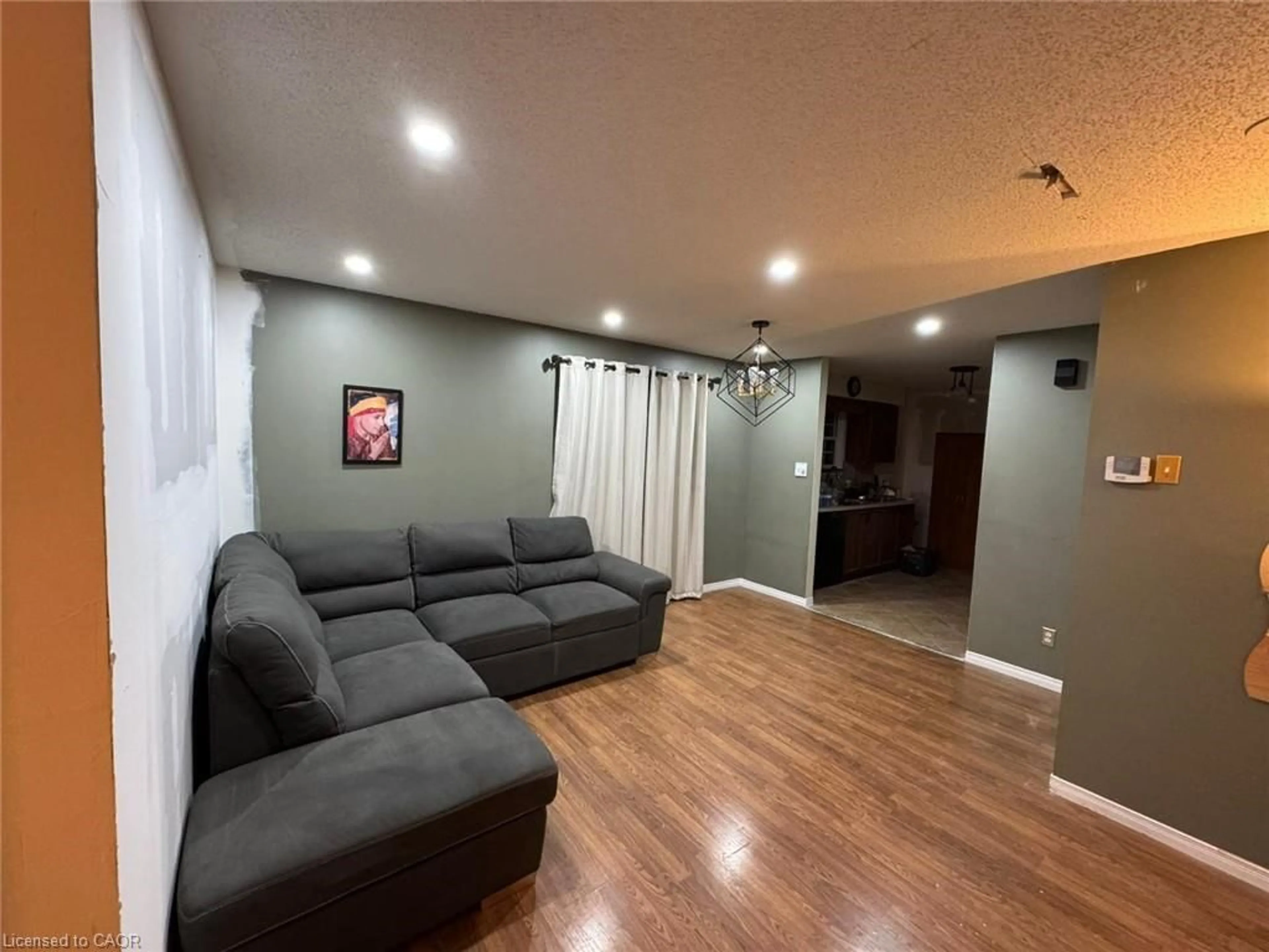 Living room with furniture, unknown for 45 Milfoil Cres, Kitchener Ontario N2E 3L2