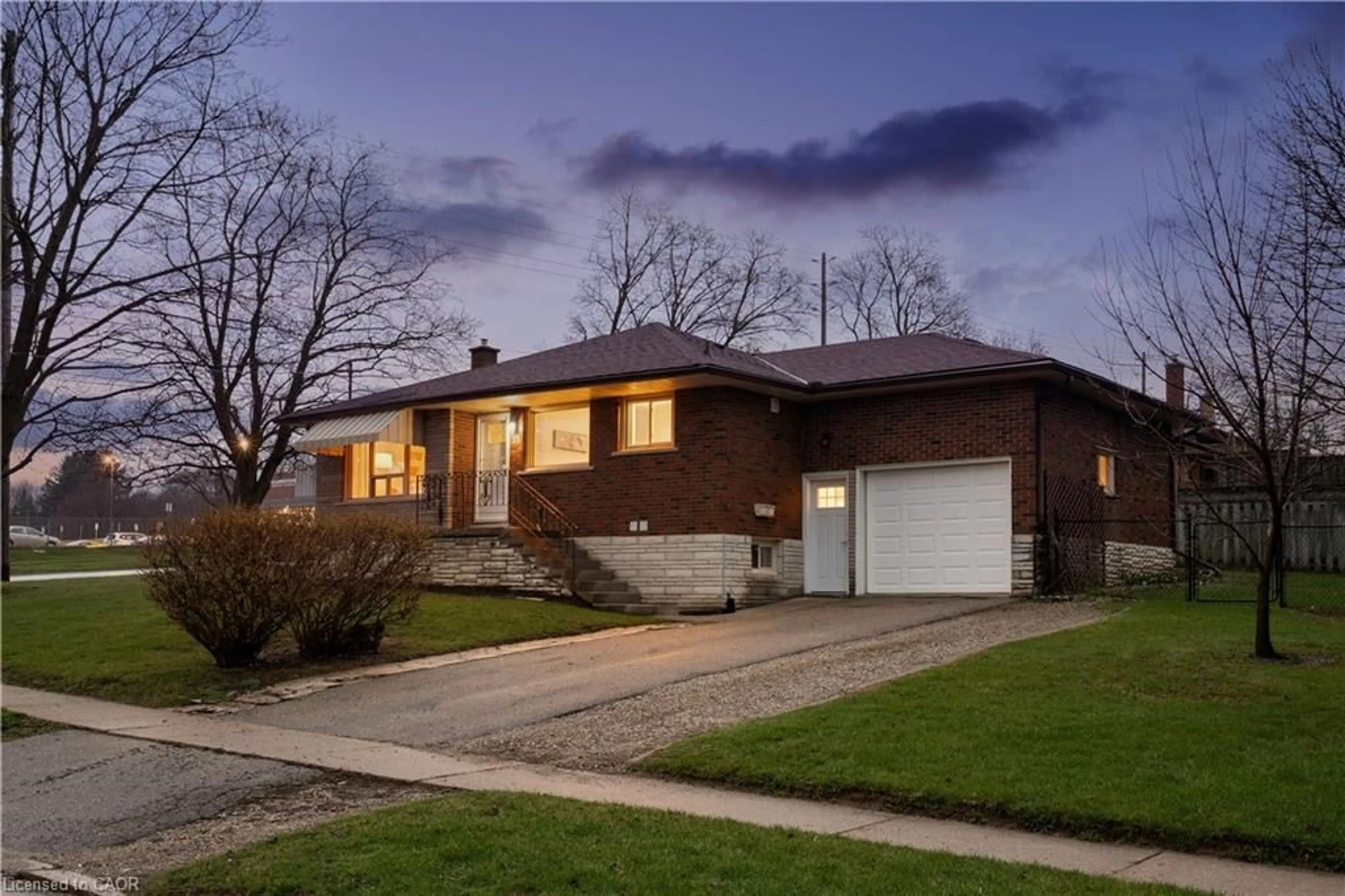 Home with brick exterior material, street for 23 Knightswood Blvd, Guelph Ontario N1E 3W3