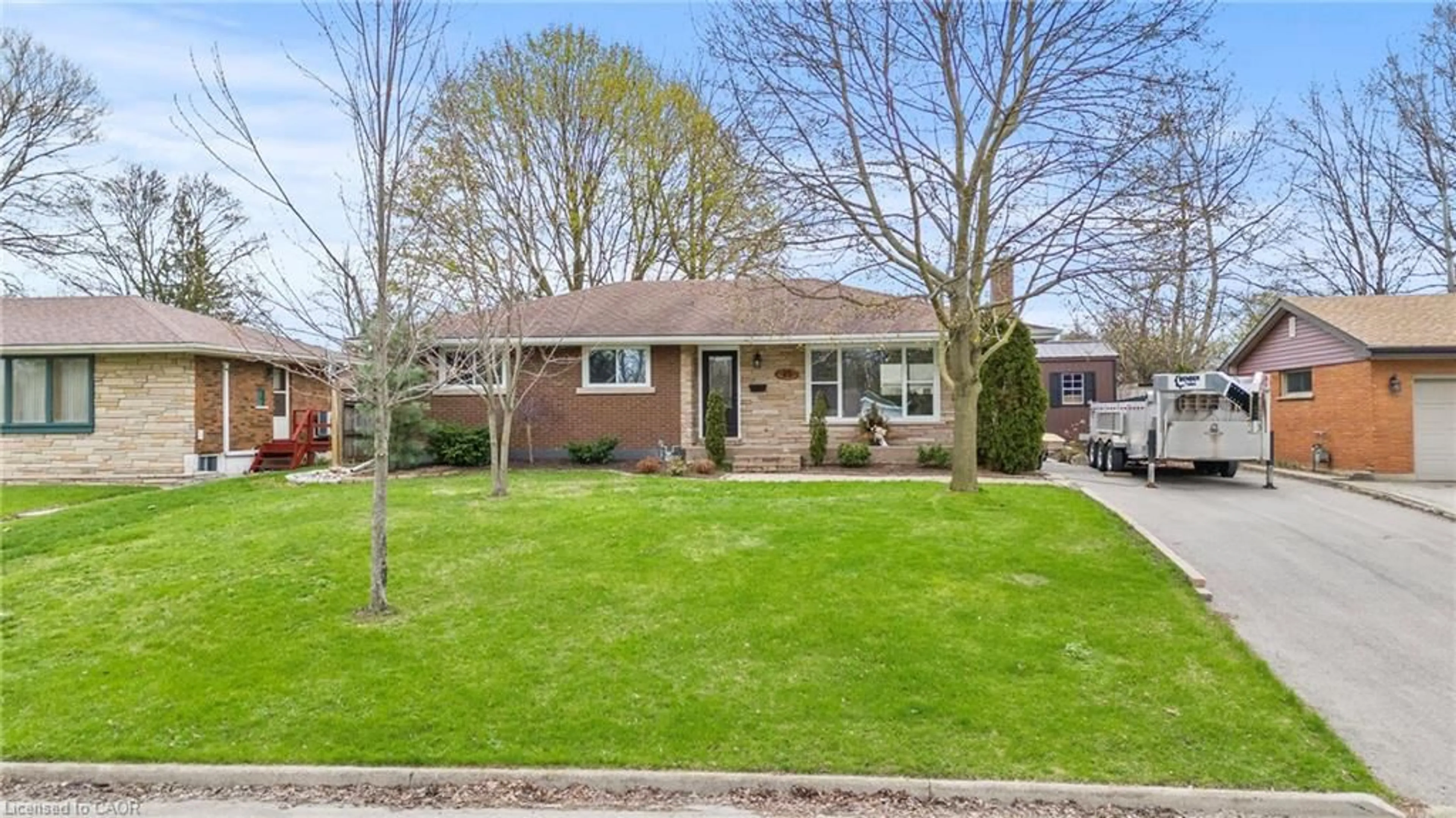 Home with brick exterior material, street for 45 Driftwood Dr, Brantford Ontario N3R 3K2