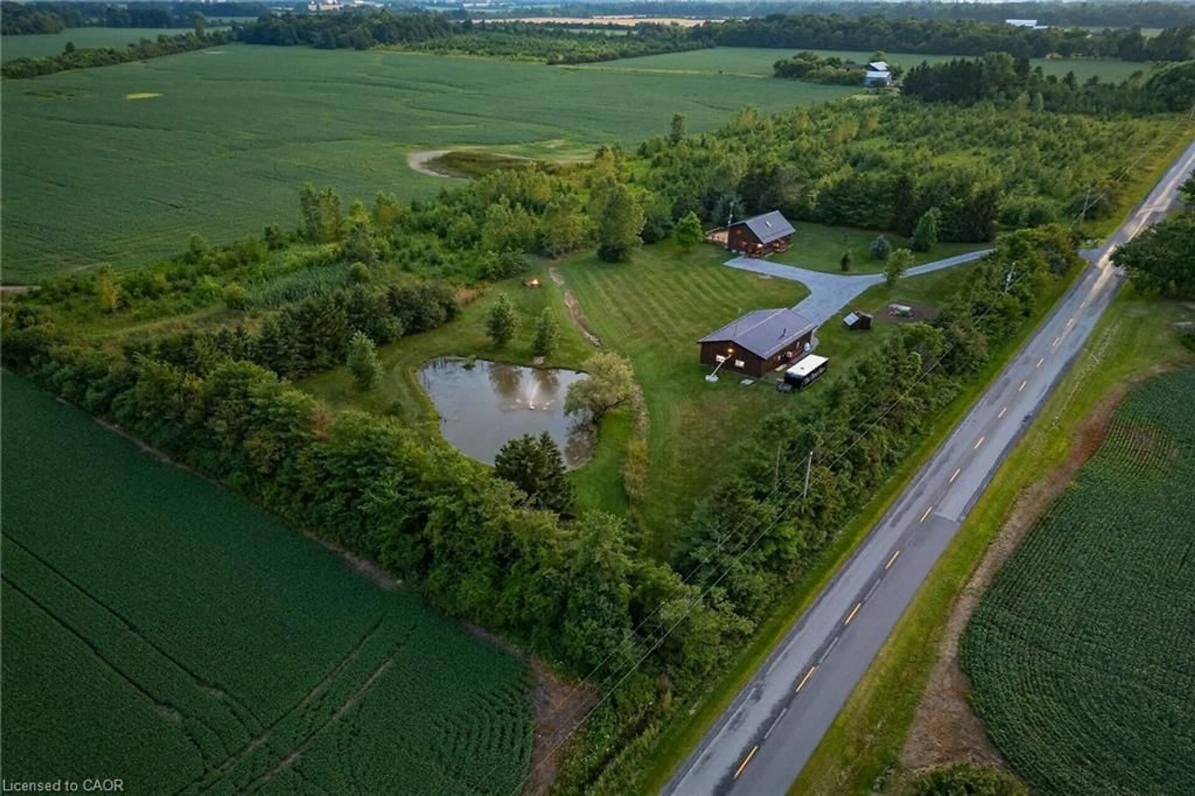A pic from outside/outdoor area/front of a property/back of a property/a pic from drone, water/lake/river/ocean view for 526 2nd Line, Hagersville Ontario N0A 1H0