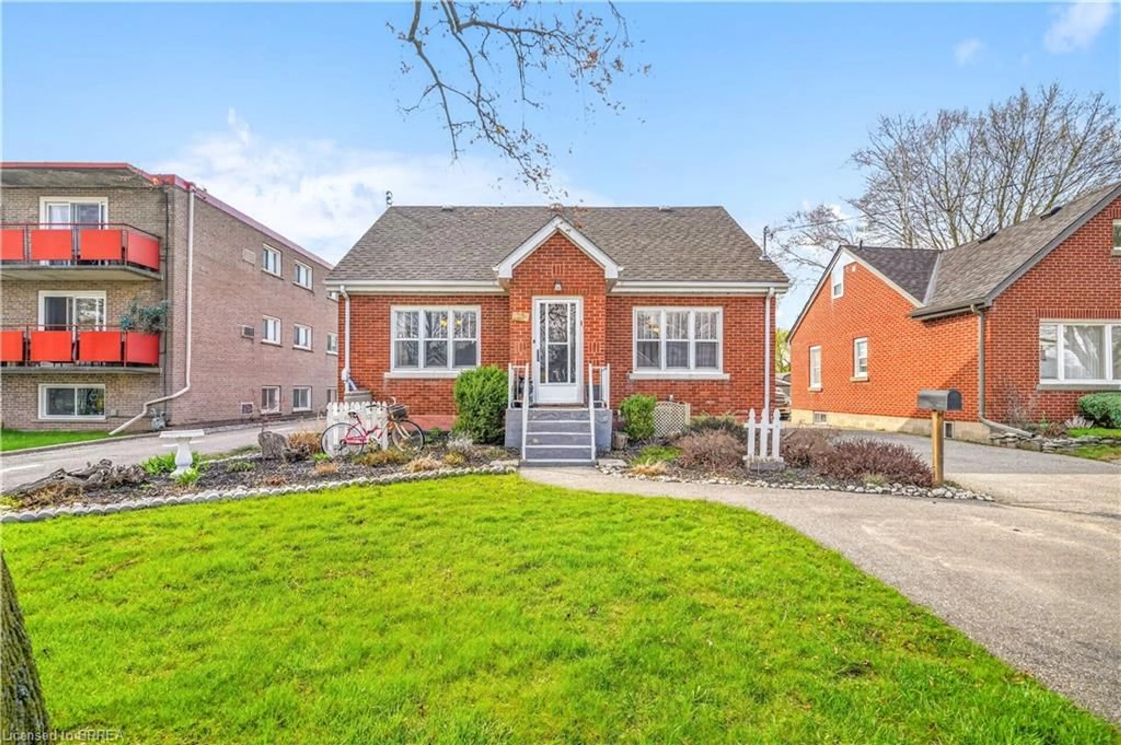 Home with brick exterior material, street for 32 Fulton St, Brantford Ontario N3R 4E5