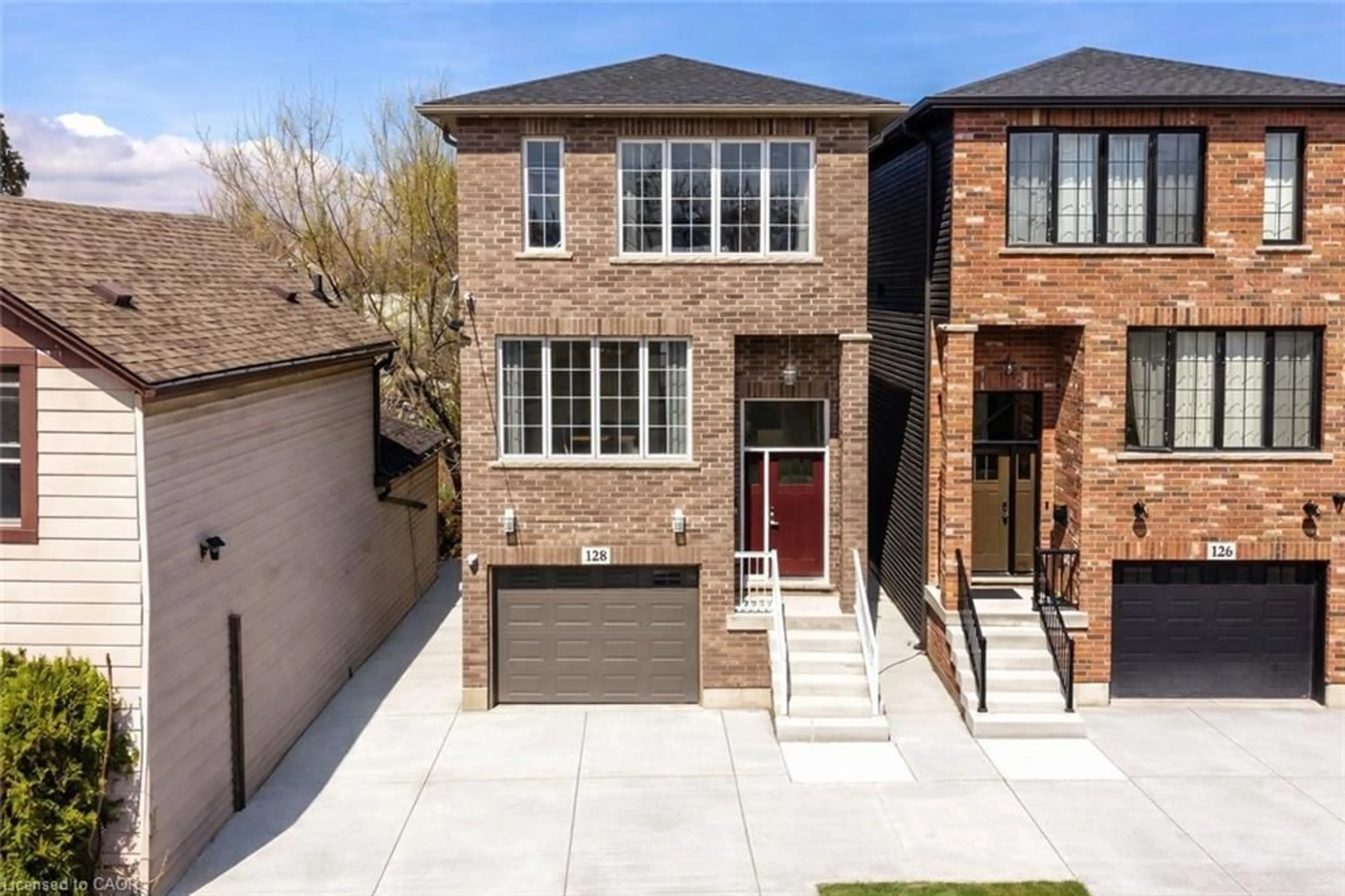 Home with brick exterior material, street for 128 Canada St, Hamilton Ontario L8P 1P5