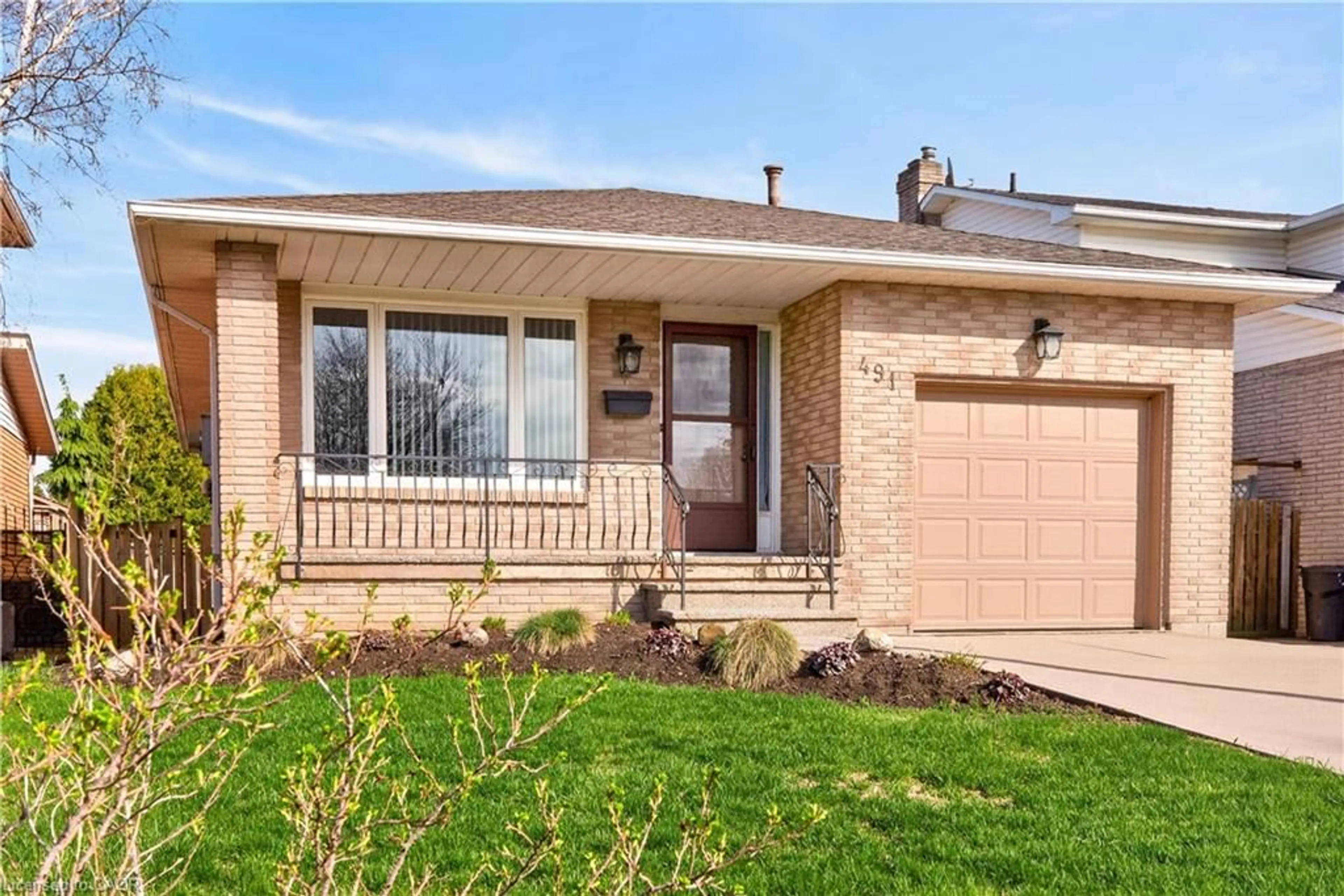 Home with brick exterior material, street for 491 Eaglewood Dr, Hamilton Ontario L8W 3J2