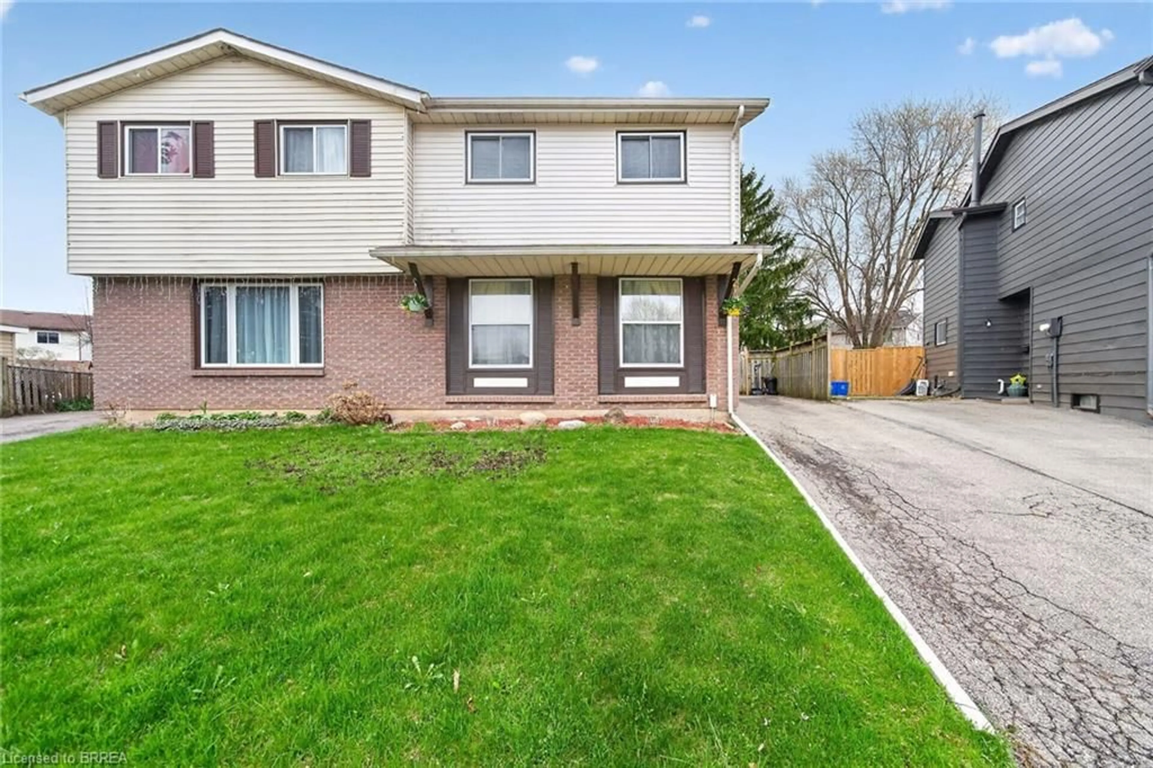 Home with brick exterior material, street for 34 Enfield Cres, Brantford Ontario N3P 1B2