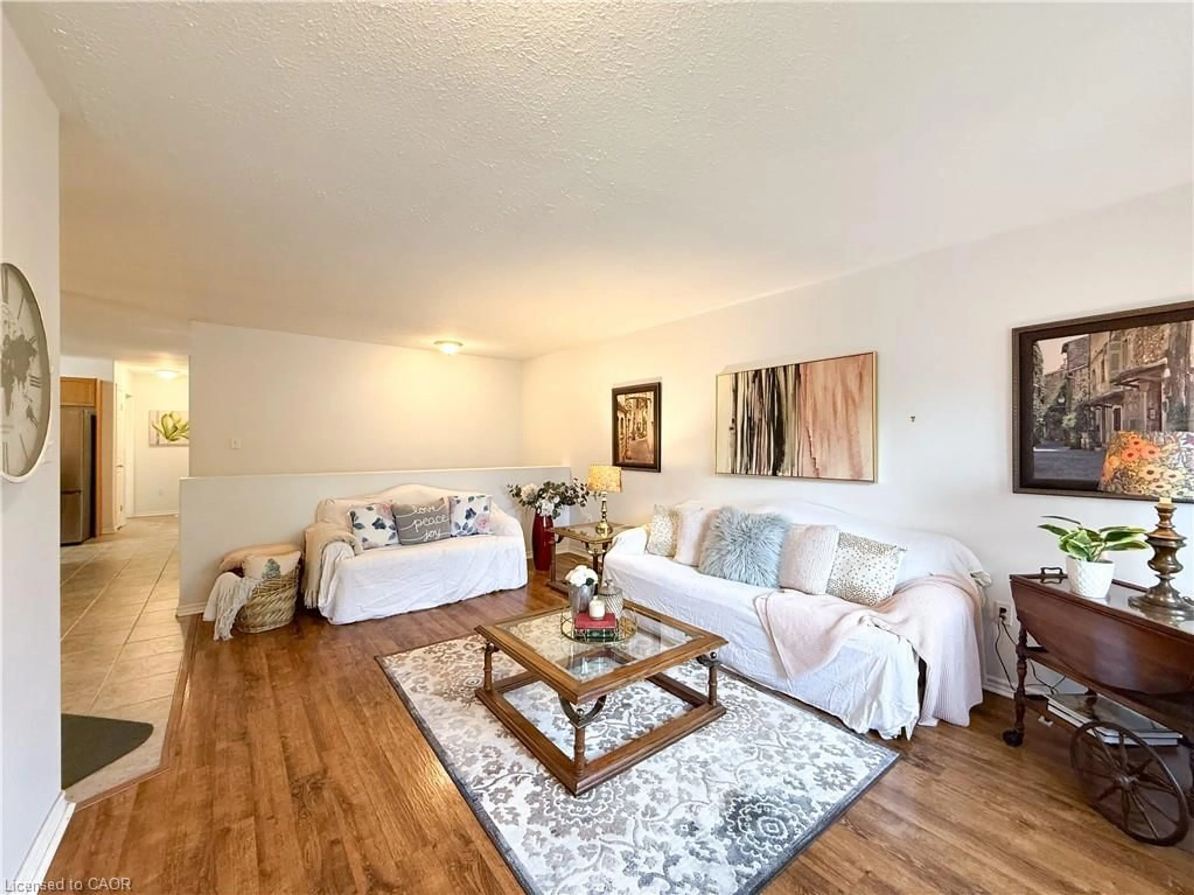 Living room with furniture, wood/laminate floor for 33A Lingwood Dr, Waterford Ontario N0E 1Y0