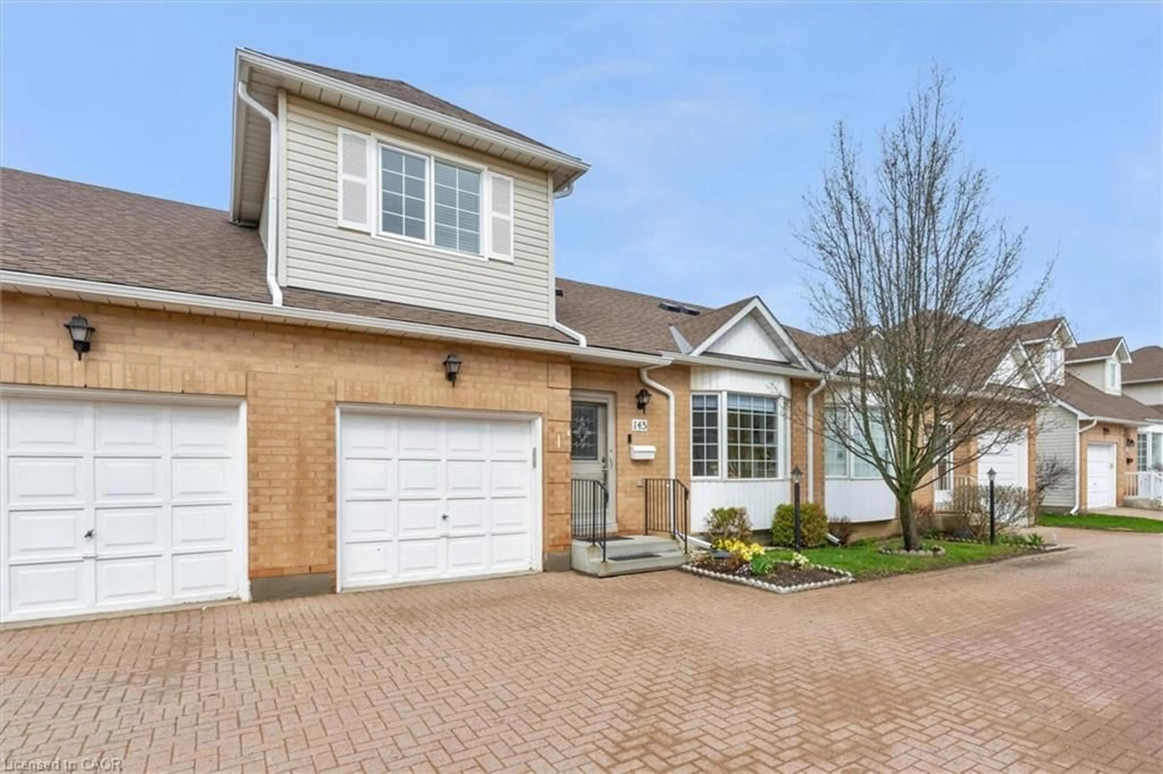Home with brick exterior material, street for 145 Silverbirch Blvd, Hamilton Ontario L0R 1W0